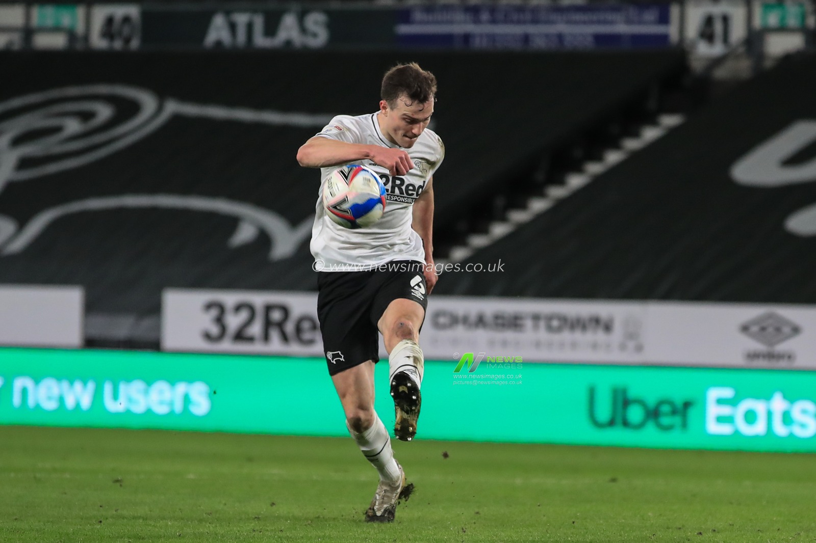 George Edmundson #6 of Derby County clears the ball from his own area