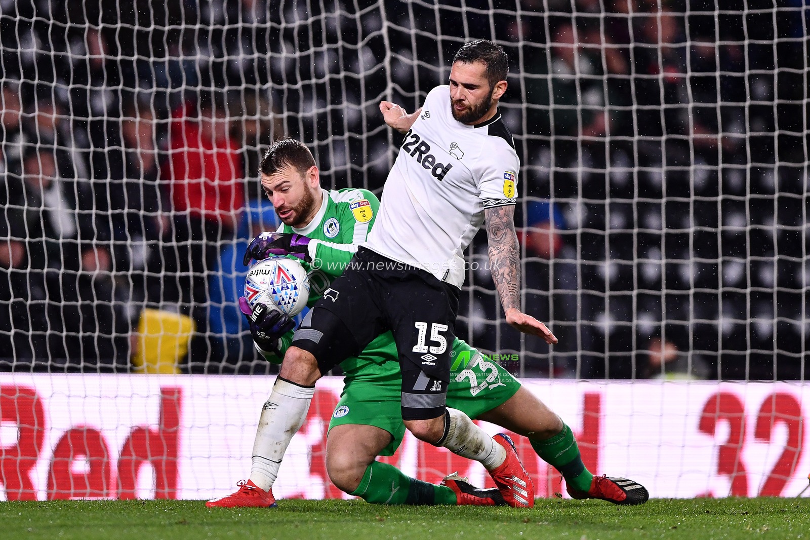 5th March 2019, Pride Park, Derby, England; Sky Bet Championship, Derby County vs Wigan Athletic ; Jamie Jones (23) of Wigan battles with Bradley Johnson (15) of Derby County 

Credit: Jon Hobley/News Images 

English Football League images are subject to DataCo Licence
