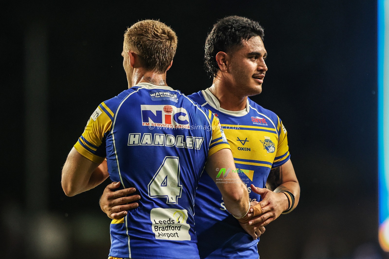 Ash Handley of Leeds Rhinos and Keenan Palasia of Leeds Rhinos celebrate the win during the Betfred Super League round 19 match Leeds Rhinos vs Salford Red Devils at Headingley Stadium, Leeds, United Kingdom, 18th July 2025

(Photo by Alfie Cosgrove/News Images)