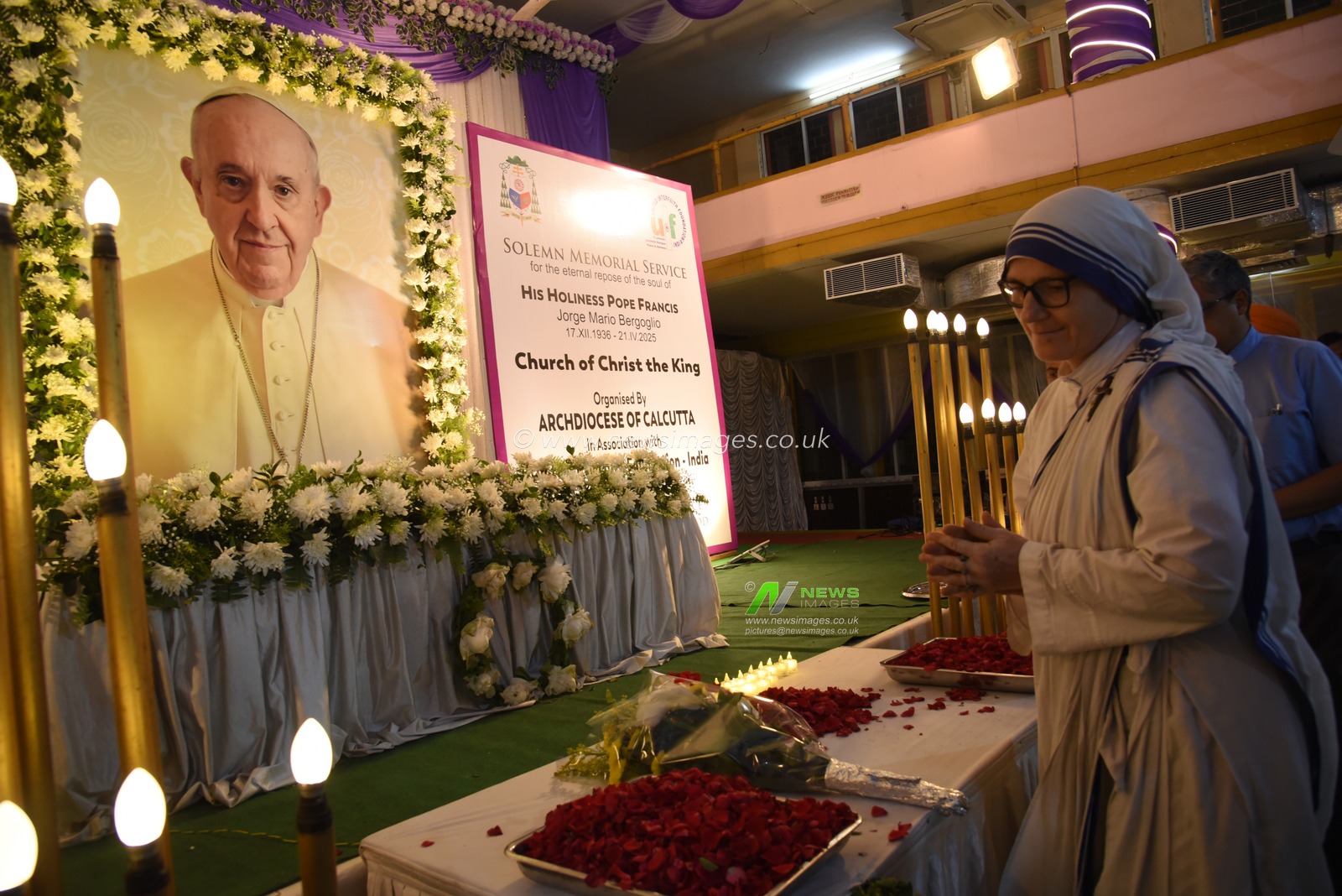 A nun of the Missionaries of Charity pray in front of the image of Pope Francis during  a Solemn Memorial Service to mourn Pope Francis at Church of Christ the King in Kolkata on April 24, 2025.Photo by Debajyoti Chakraborty.(Photo: Debajyoti Chakraborty/News Images)