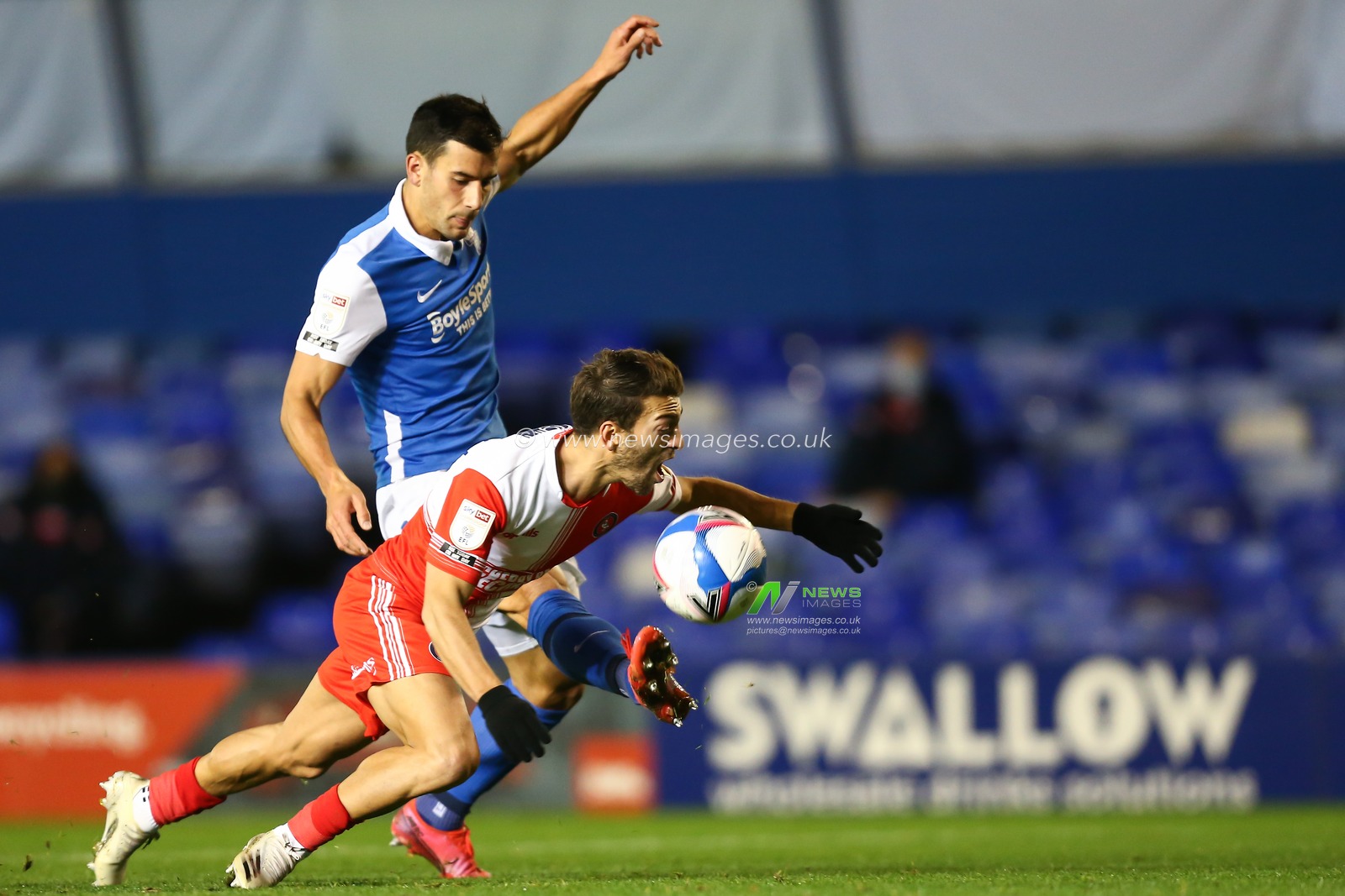 Scott Kashket (11) of Wycombe Wanderers is fouled by Maxime Colin (2) of Birmingham City
