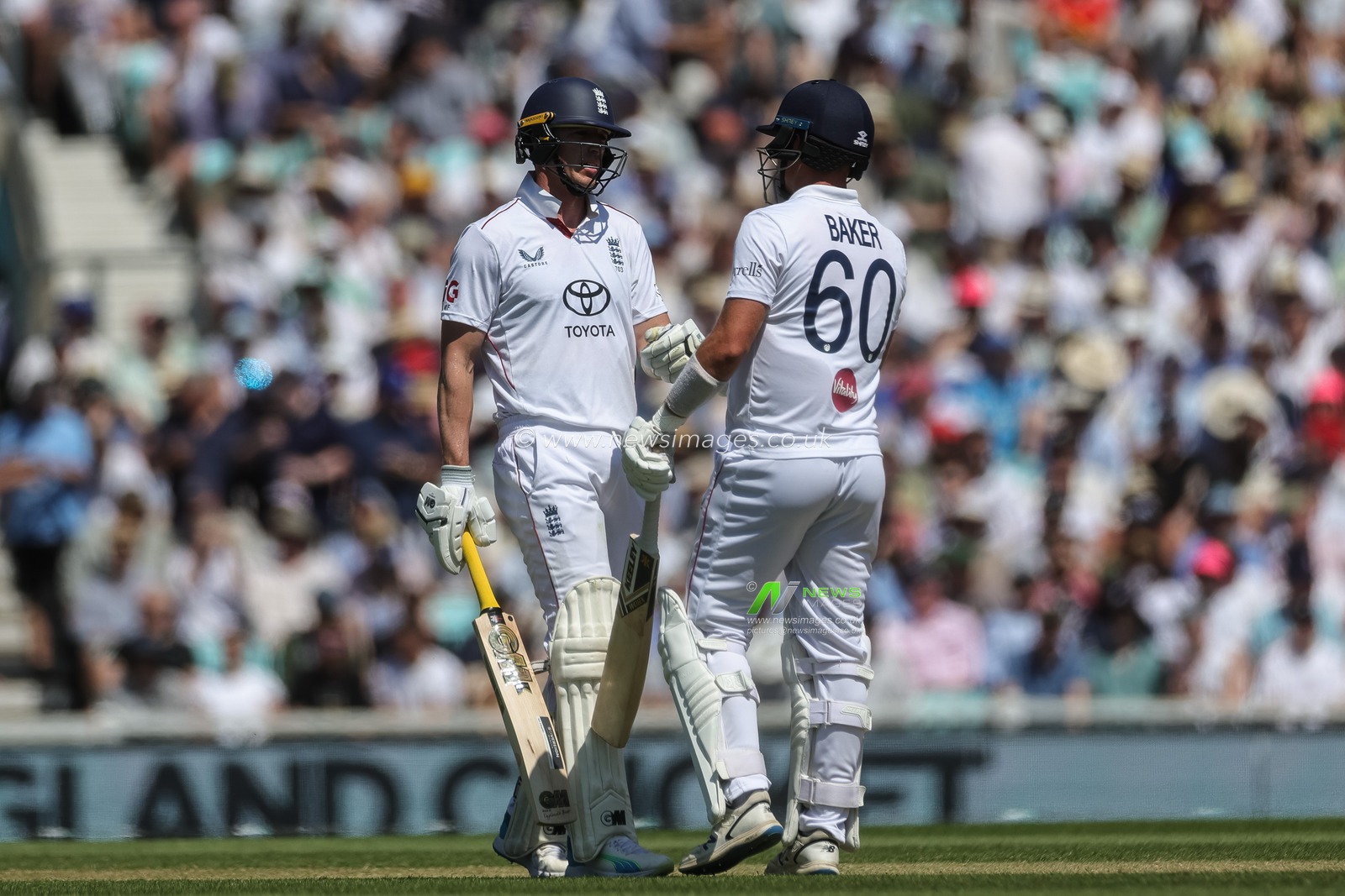 Matthew Fisher of England and Sonny Baker of England celebrated Englands 250th run during the 2nd Rothesay Test Match Day 3 match England vs New Zealand at The Kia Oval, London, United Kingdom on 19 June 2026

(Photo by Mark Cosgrove/News Images)