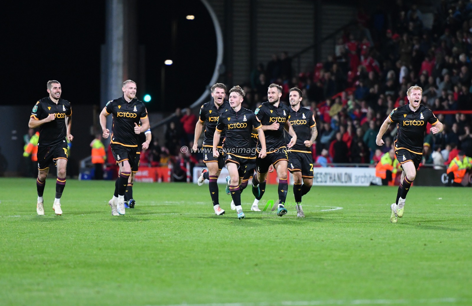 Bradford celebrates winning the shootout, during the Carabao Cup match Wrexham vs Bradford City at The Racecourse Ground, Wrexham, United Kingdom, 29th August 2023

(Photo by Cody Froggatt/News Images)
