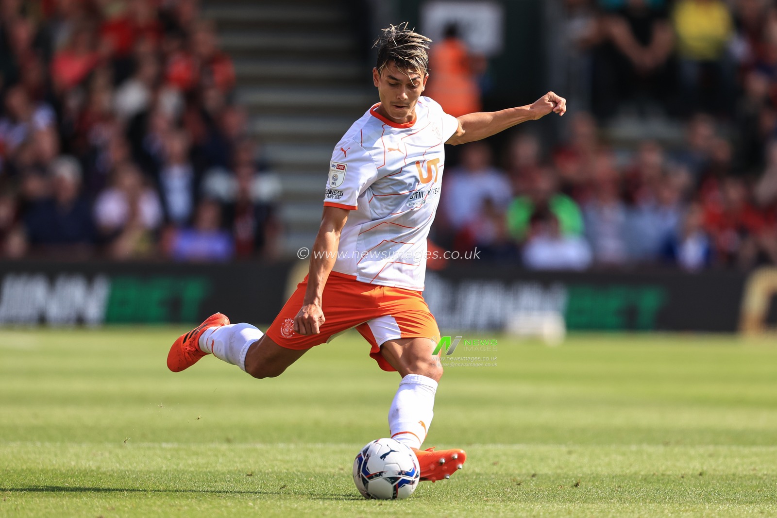 Kenny Dougall #12 of Blackpool in action during the game