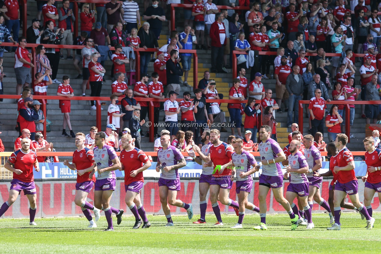 Hull KR players warm up in front of the East Stand fans