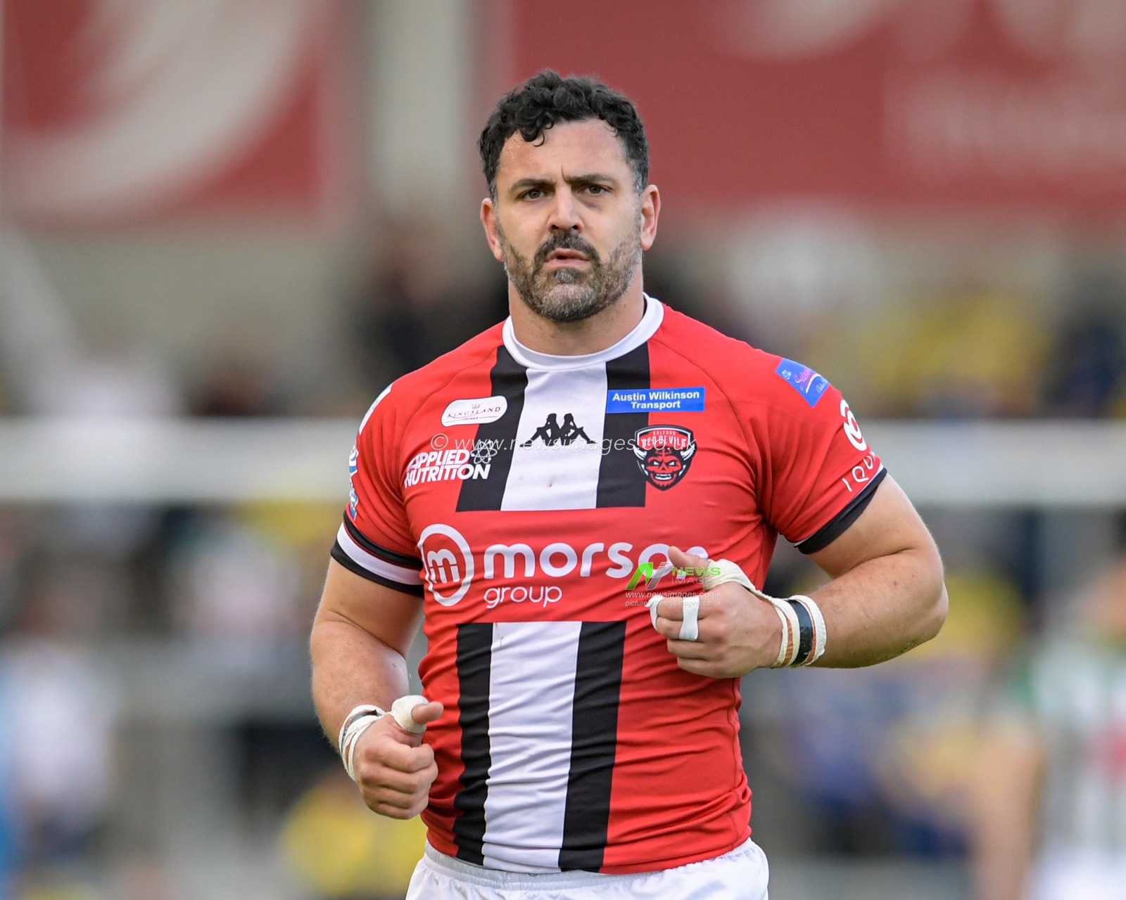 Rhys Williams (22) of Salford Red Devils in action during the game