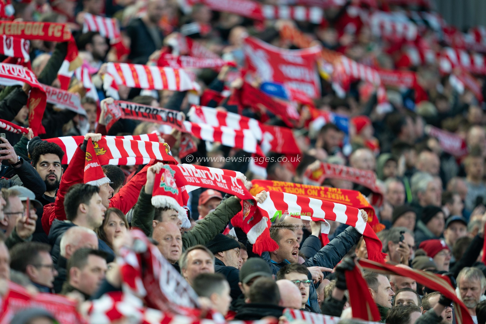 Fans holds  scarfs above their heads

9th April 2019 , Anfield Stadium, Liverpool, England;  EUFA Champions League Quarter Final, First Leg, Liverpool FC vs FC Porto 

Credit: Terry Donnelly/News Images