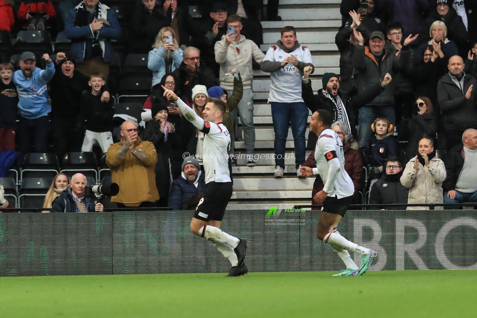 James Collins #9 of Derby County celebrates his goal to make it 1-0 during the Sky Bet League 1 match Derby County vs Barnsley at Pride Park Stadium, Derby, United Kingdom, 11th November 2023

(Photo by Alfie Cosgrove/News Images)