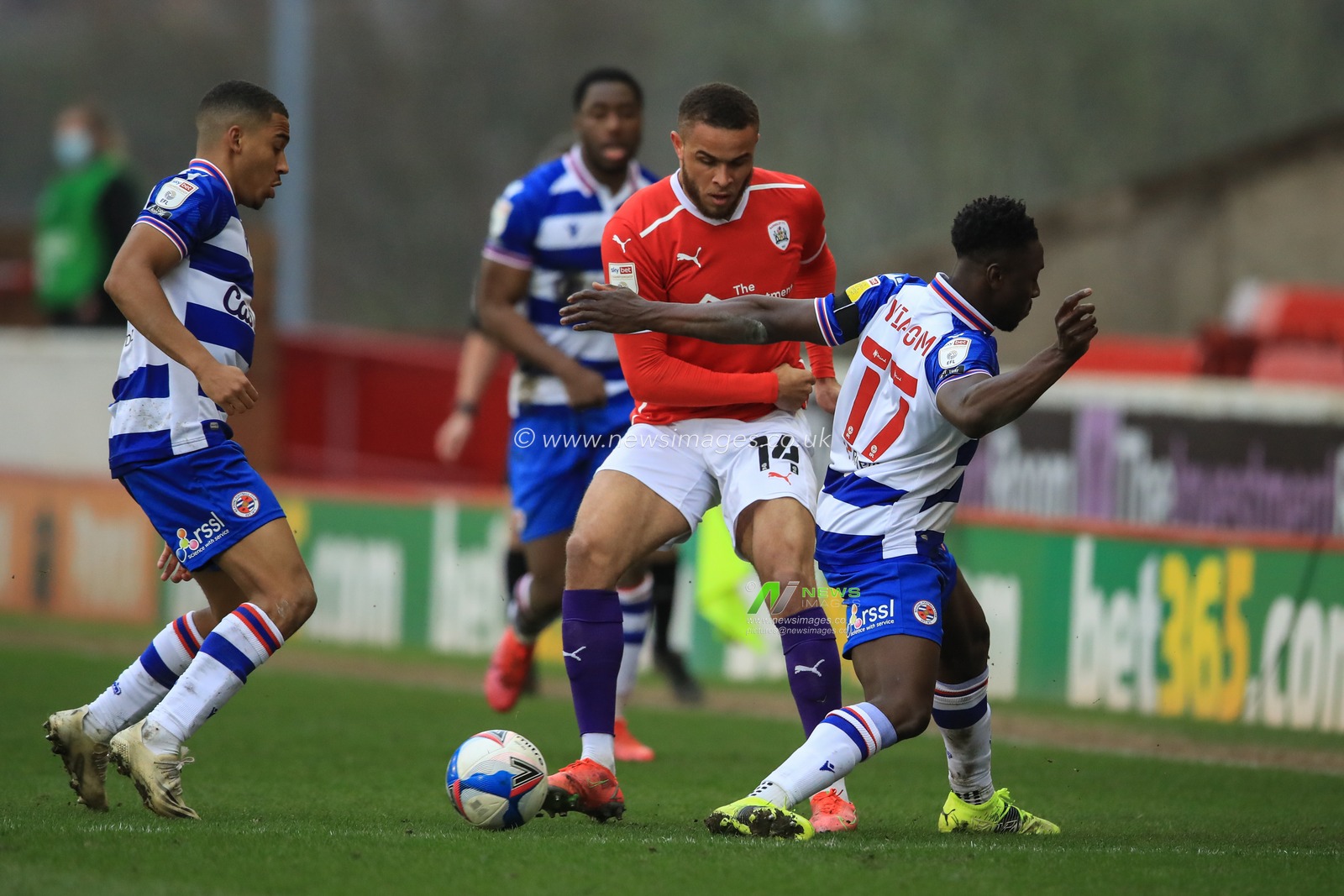 Carlton Morris #14 of Barnsley clears the ball