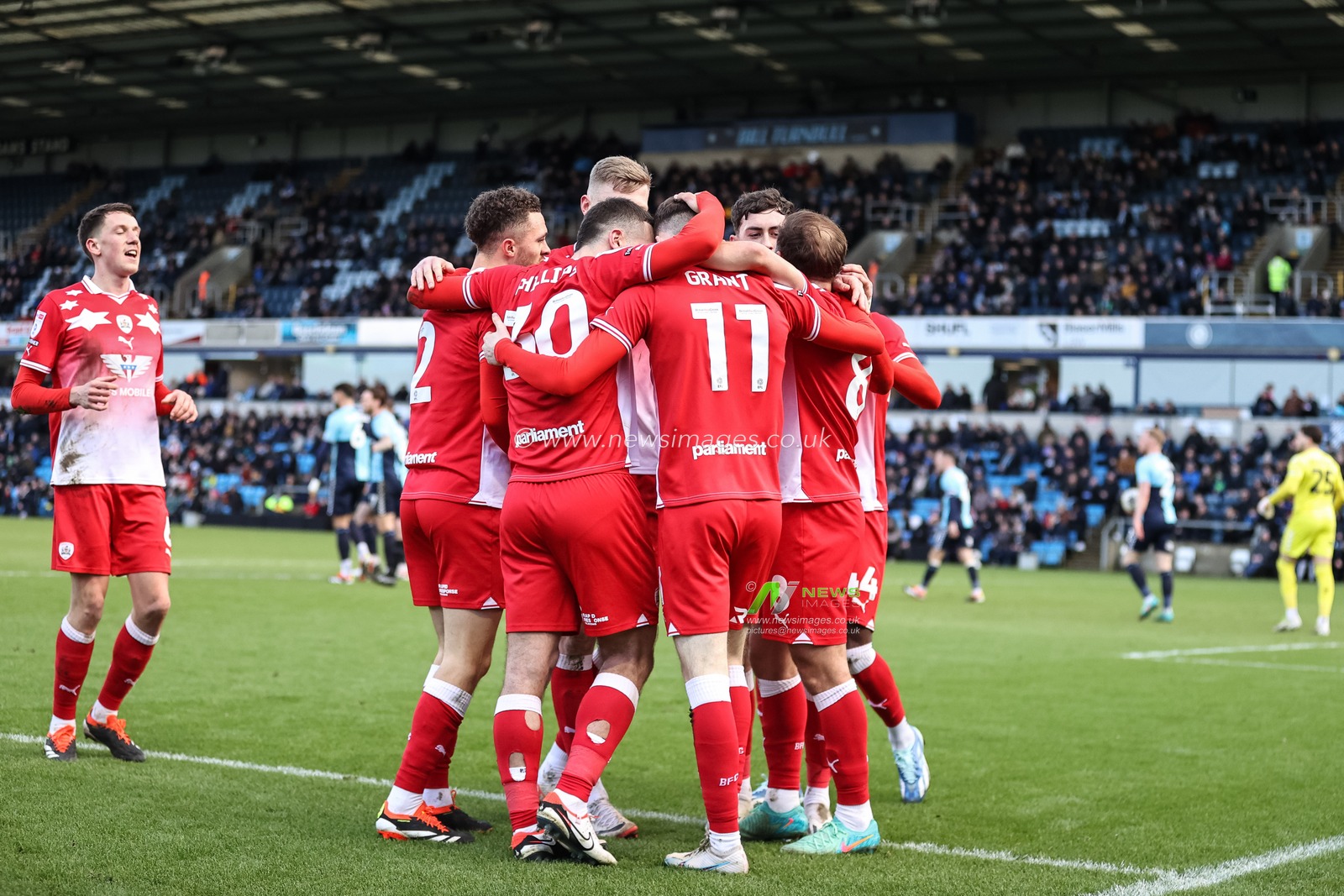 Conor Grant of Barnsley celebrates his goal to make it 2-4 with team mates during the Sky Bet League 1 match Wycombe Wanderers vs Barnsley at Adams Park, High Wycombe, United Kingdom, 2nd March 2024

(Photo by Mark Cosgrove/News Images)