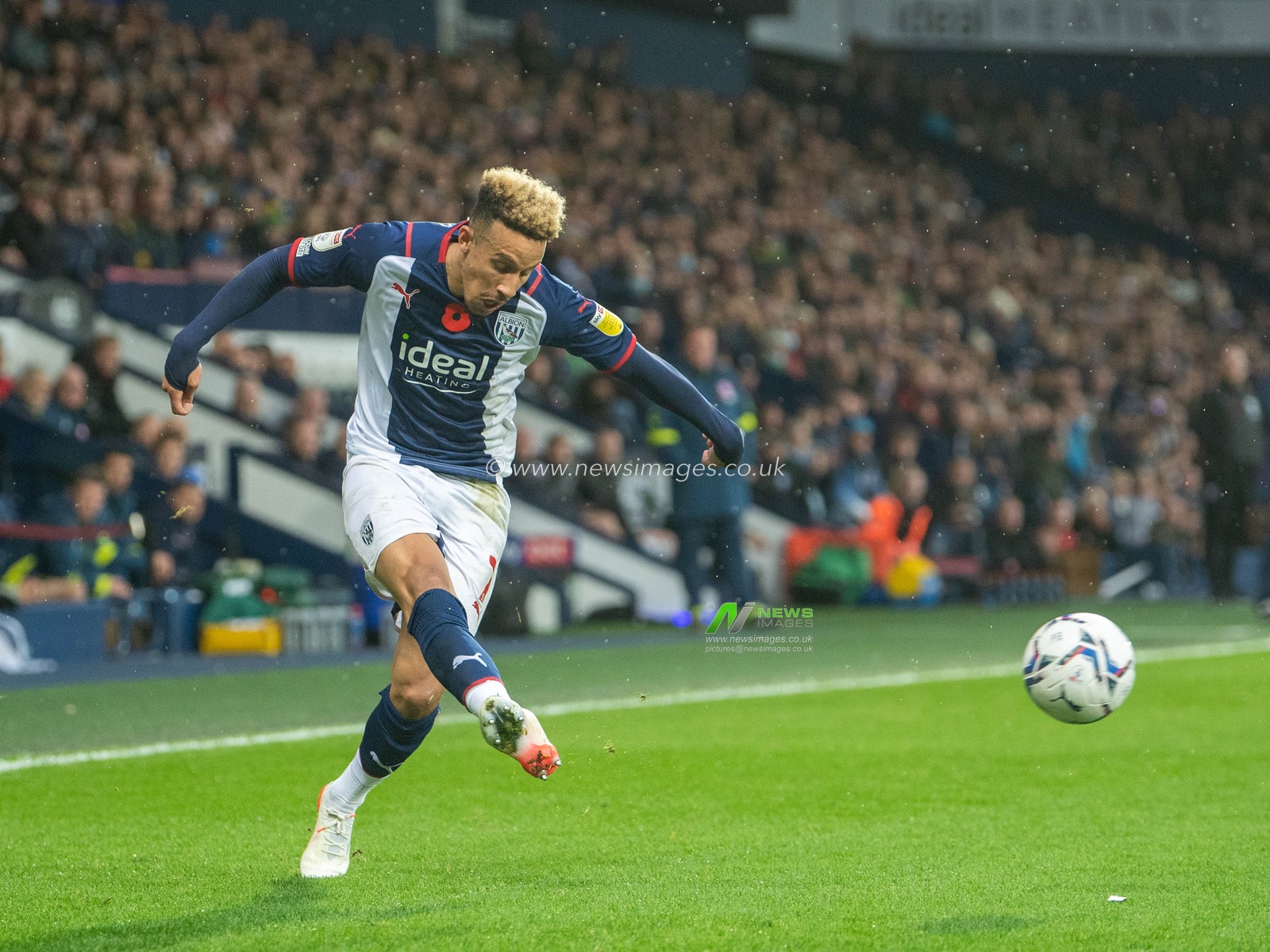 Callum Robinson #7 of West Bromwich Albion crosses the ball into the Middlesbrough area