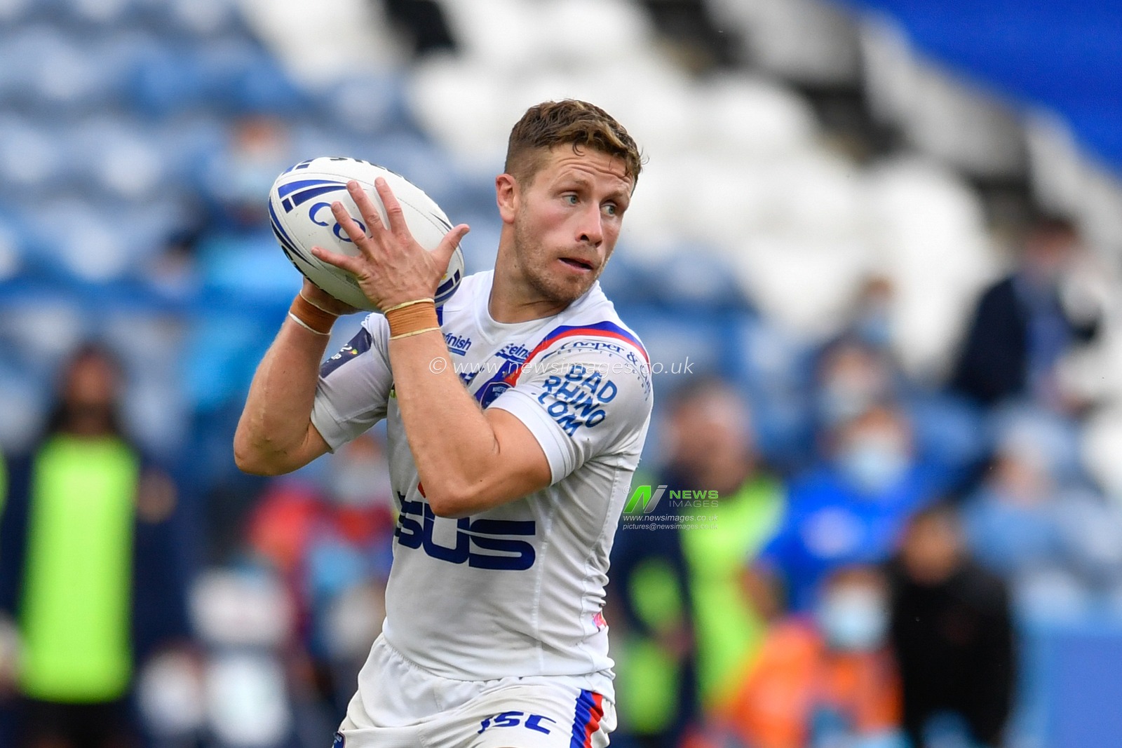 Kyle Wood (9) of Wakefield Trinity looks for a pass