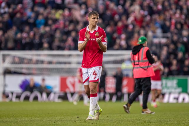 Wrexham's Max Cleworth celebrates at full time during the Sky Bet League 1 match Wrexham vs Stockport County at SToK Cae Ras, Wrexham, United Kingdom, 22nd March 2025

(Photo by Nik Mesney/News Images)