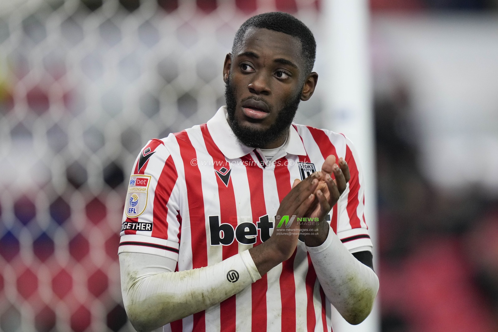 Junior Tchamadeu of Stoke City salutes the fans after he was substituted during the Sky Bet Championship match Stoke City vs Queens Park Rangers at Bet365 Stadium, Stoke-on-Trent, United Kingdom, 14th February 2024

(Photo by Steve Flynn/News Images)