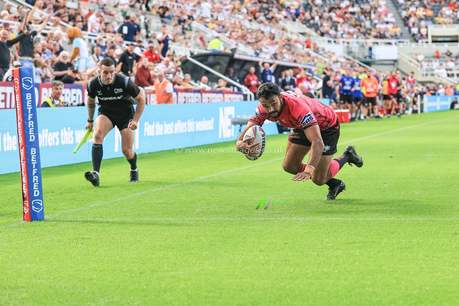 Bevan French #1 of Wigan Warriors goes over for a try