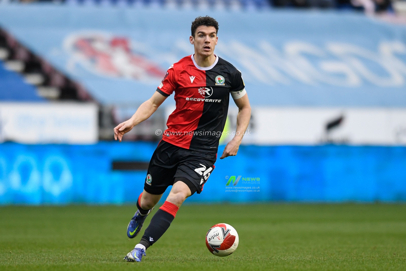 Darragh Lenihan #26 of Blackburn Rovers runs with the ball