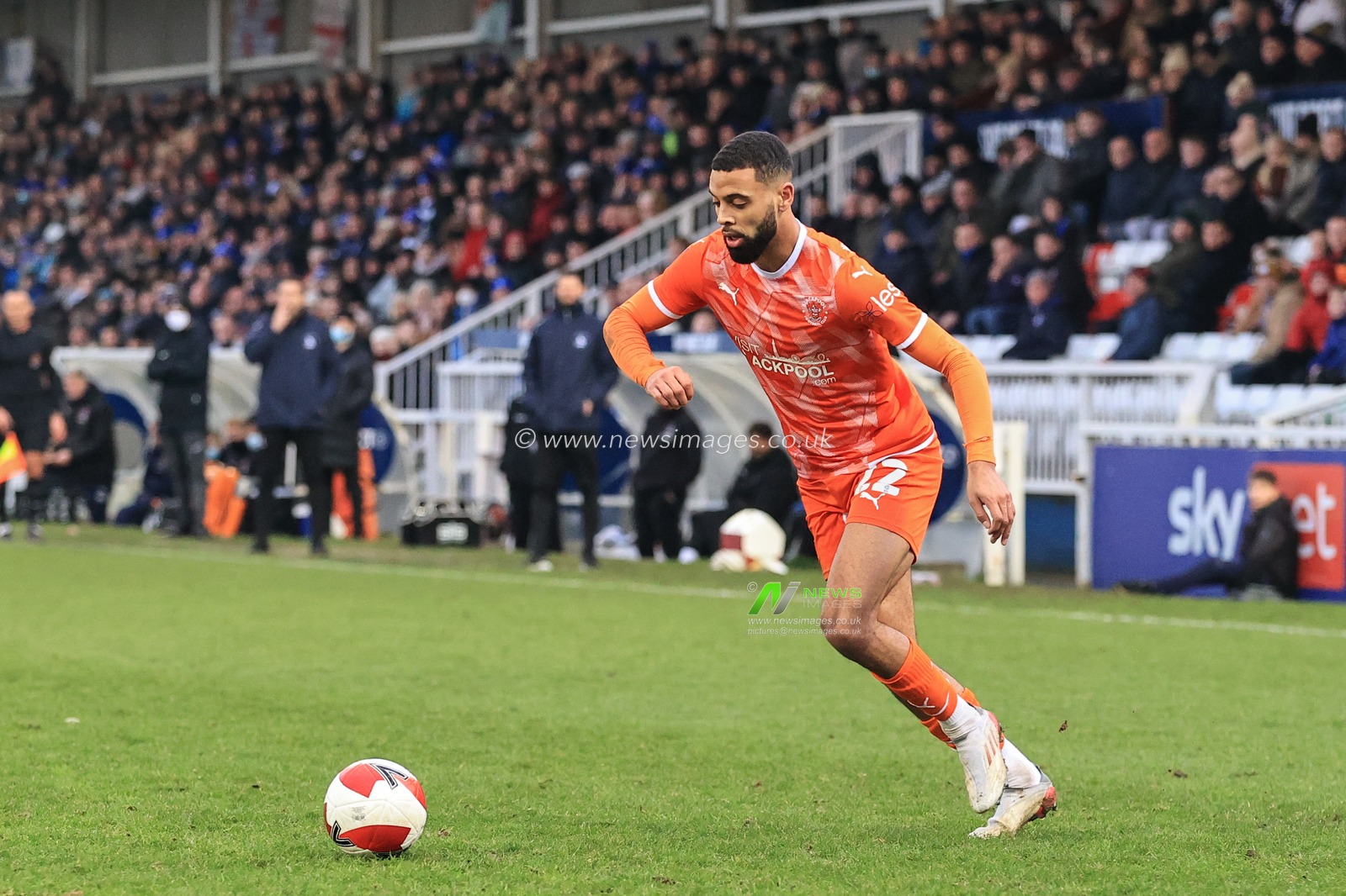 Cj Hamilton #22 of Blackpool in action during the game