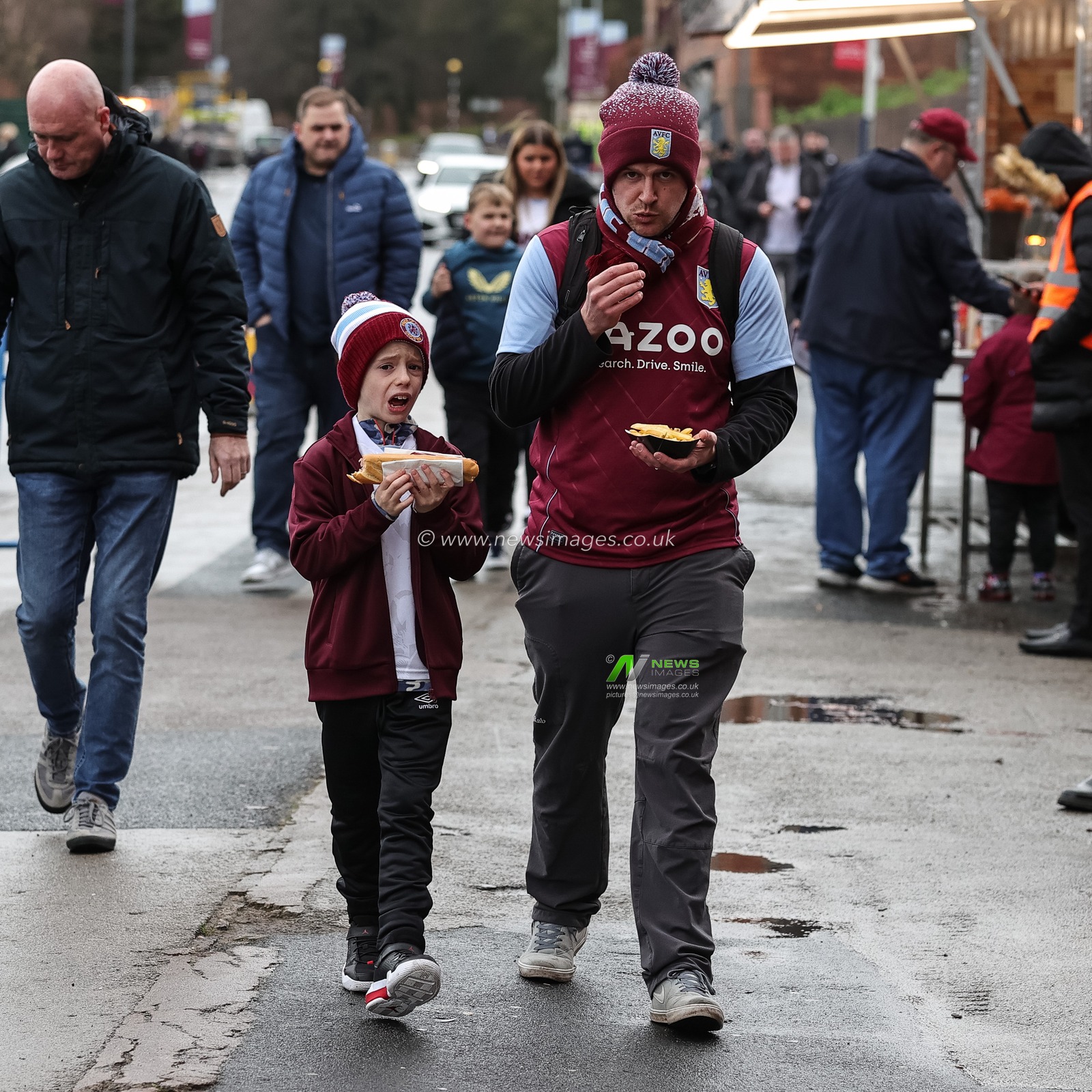 Aston Villa fans grab a bite to eat on their way to Villa Park during the Premier League match Aston Villa vs Burnley at Villa Park, Birmingham, United Kingdom, 30th December 2023

(Photo by Mark Cosgrove/News Images)