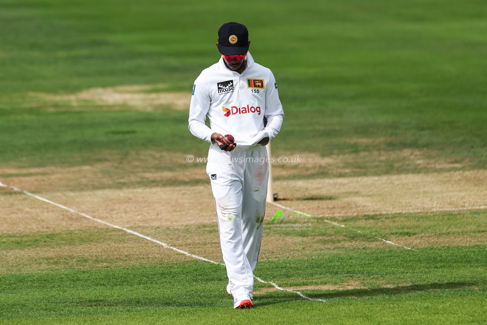 Pathum Nissanka of Sri Lanka polishes the ball during the England Men v Sri Lanka 2nd Rothesay Test Match Day 1 at Lords, London, United Kingdom, 29th August 2024

(Photo by Mark Cosgrove/News Images)