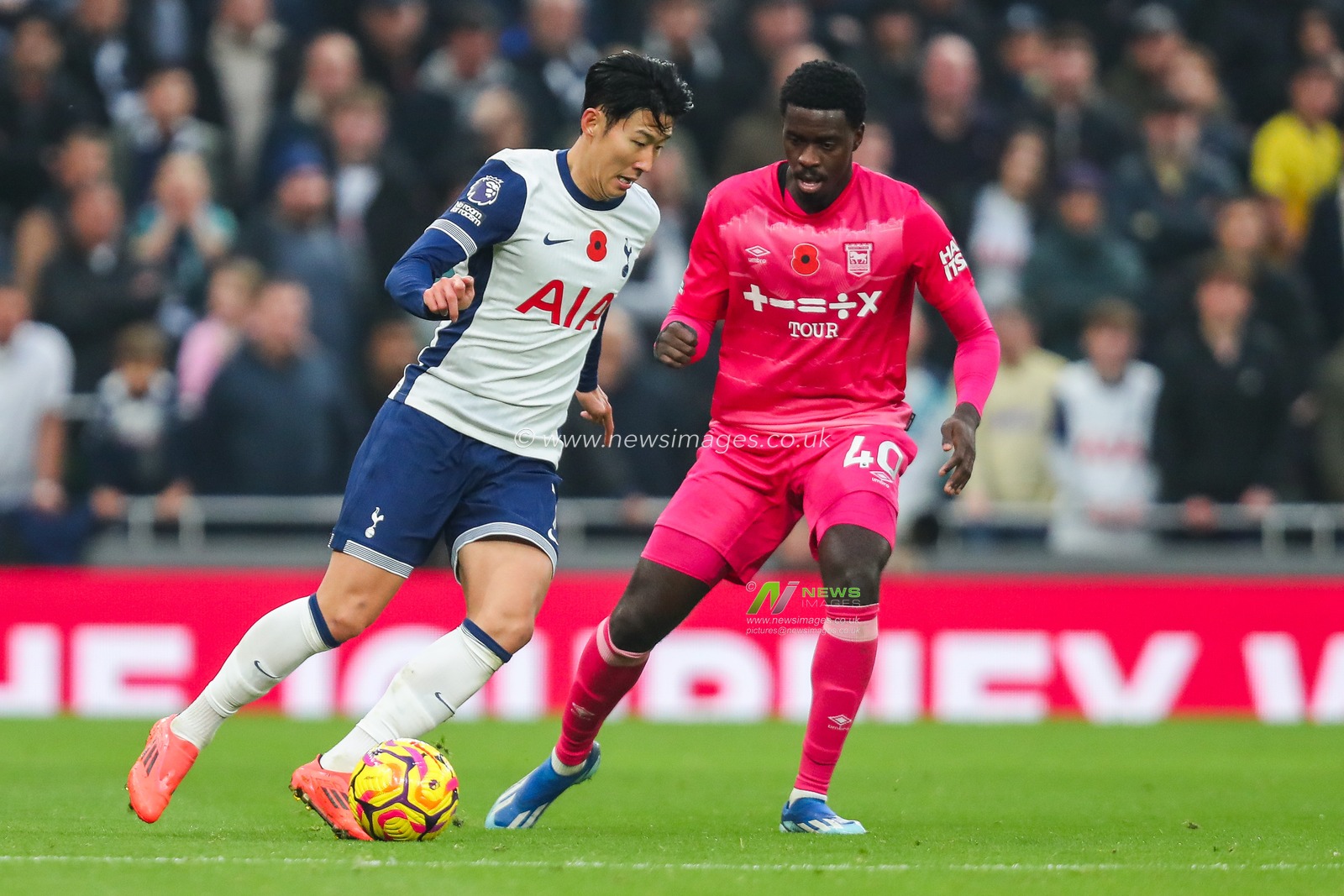 Heung-min Son of Tottenham Hotspur is put under pressure by Axel Tuanzebe of Ipswich Town during the Premier League match Tottenham Hotspur vs Ipswich Town at Tottenham Hotspur Stadium, London, United Kingdom, 10th November 2024

(Photo by Izzy Poles/News Images)