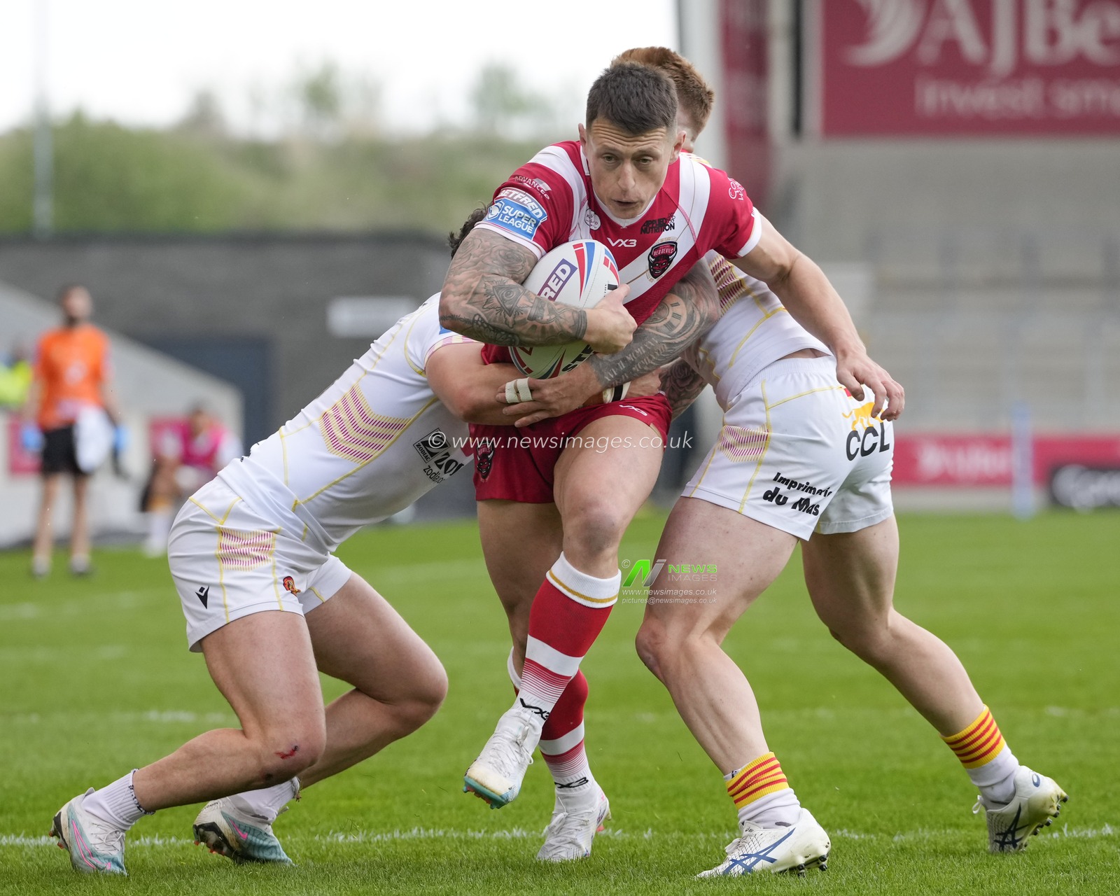 Deon Cross #28 of Salford Red Devils runs at Arthur Romano #19 of Catalans Dragons during the Betfred Super League Round 10 match Salford Red Devils vs Catalans Dragons at AJ Bell Stadium, Eccles, United Kingdom, 23rd April 2023

(Photo by Steve Flynn/News Images)