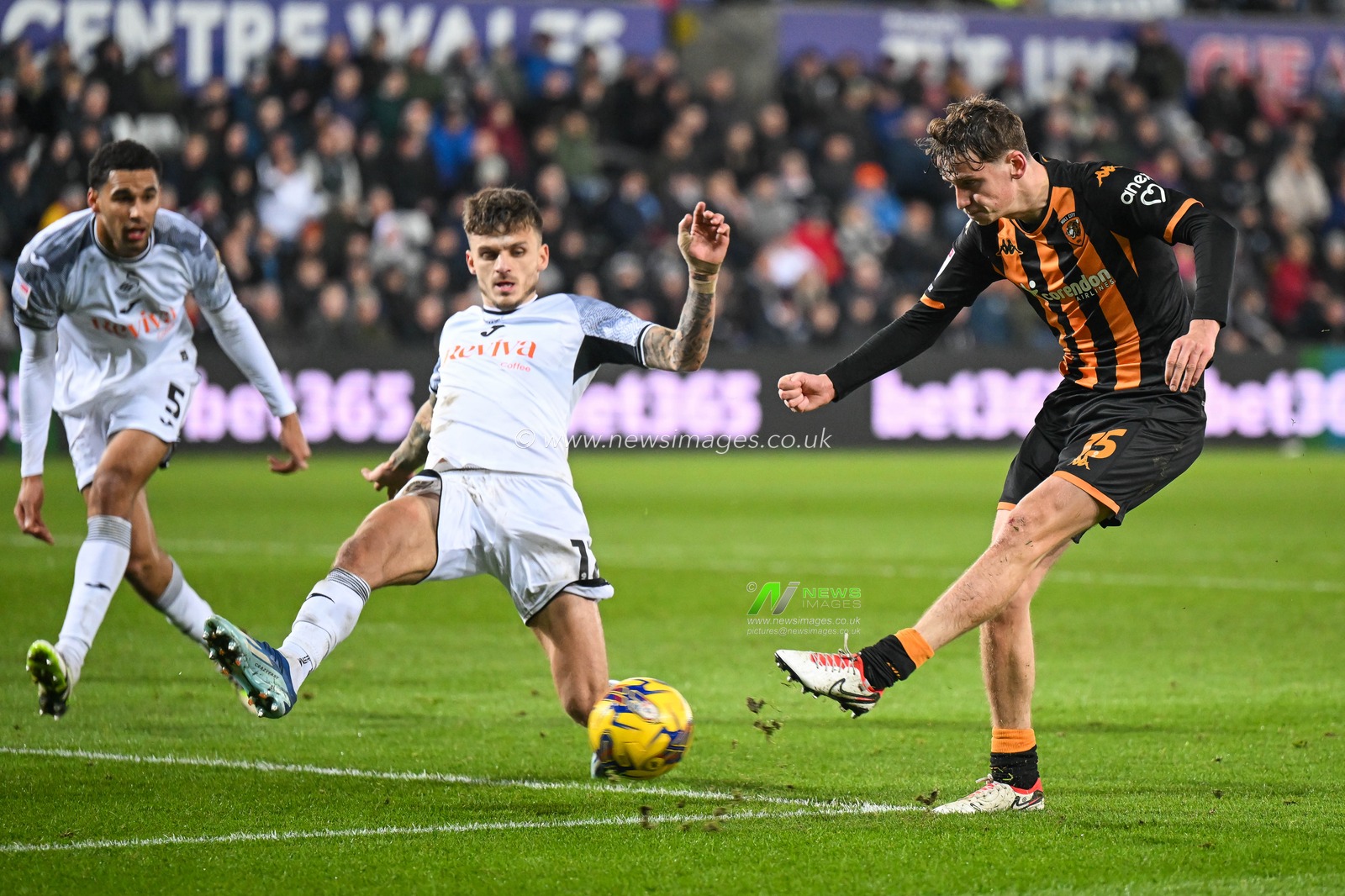 Tyler Morton #15 of Hull City shoots on goal during the Sky Bet Championship match Swansea City vs Hull City at Swansea.com Stadium, Swansea, United Kingdom, 25th November 2023

(Photo by Craig Thomas/News Images)