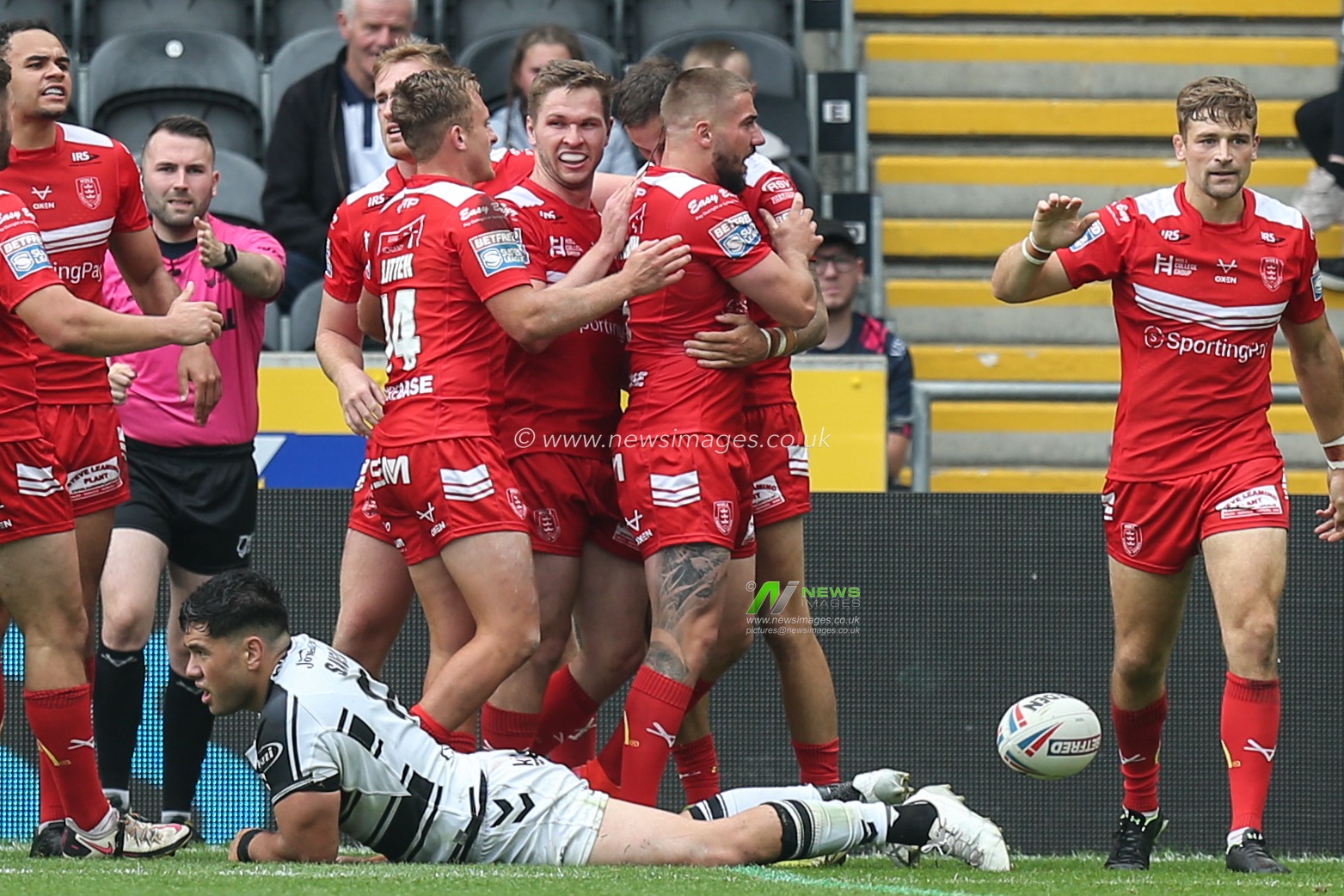 Ben Crooks (2) of Hull KR celebrates his try