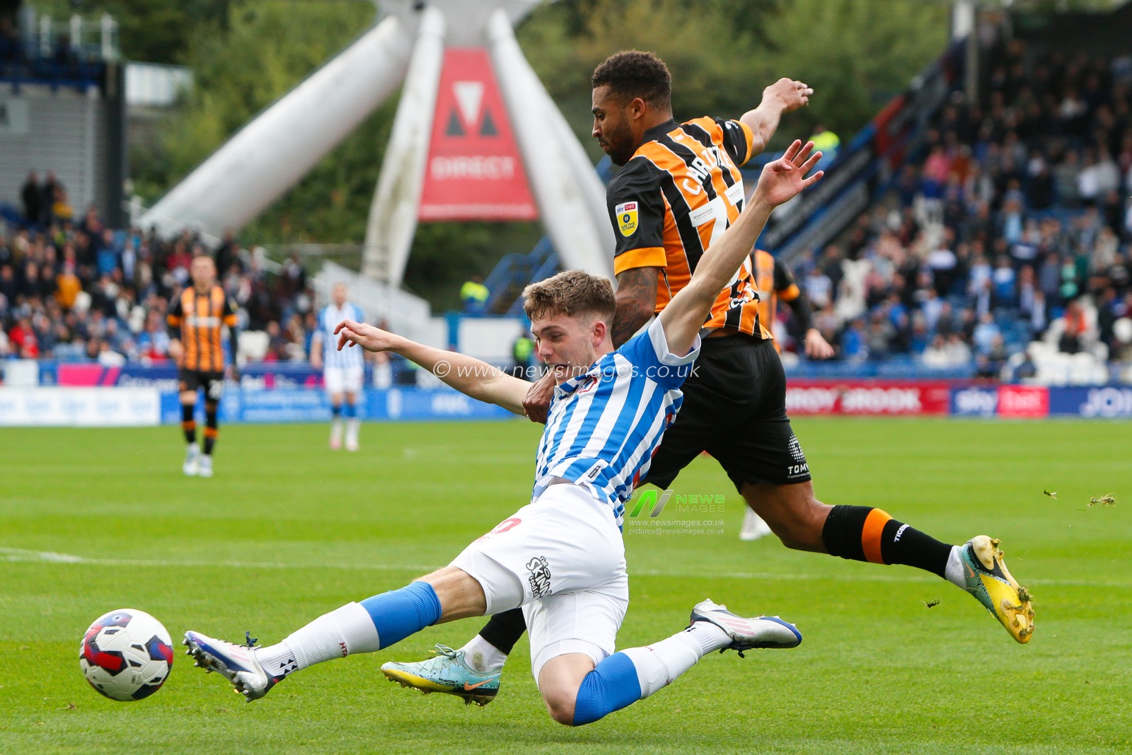 Ben Jackson #30 of Huddersfield Town and Cyrus Christie #33 of Hull City during the Sky Bet Championship match Huddersfield Town vs Hull City at John Smith's Stadium, Huddersfield, United Kingdom, 9th October 2022

(Photo by Ben Early/News Images)