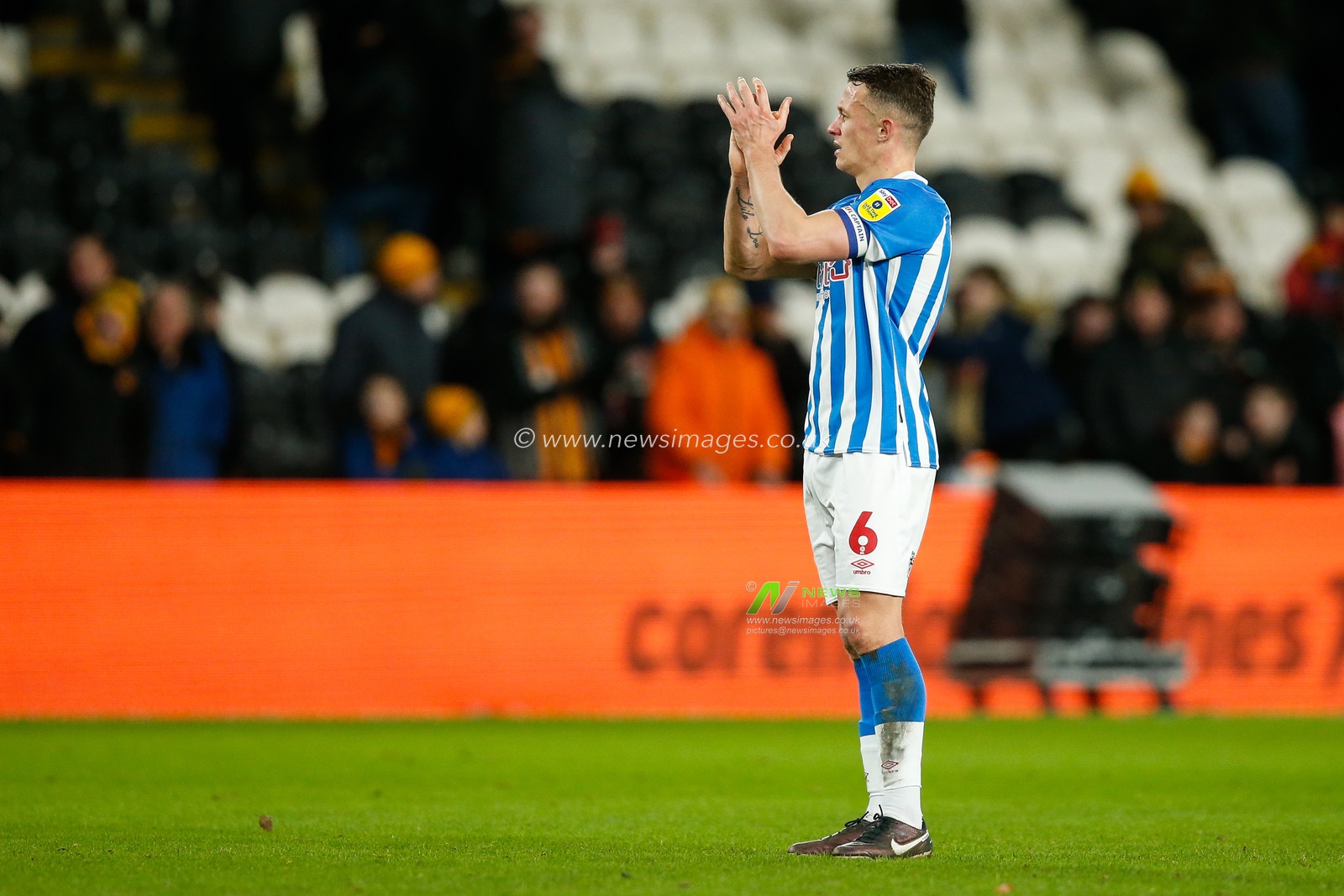 Jonathan Hogg #6 of Huddersfield Town applauds fans after the Sky Bet Championship match Hull City vs Huddersfield Town at MKM Stadium, Hull, United Kingdom, 14th January 2023

(Photo by Ben Early/News Images)