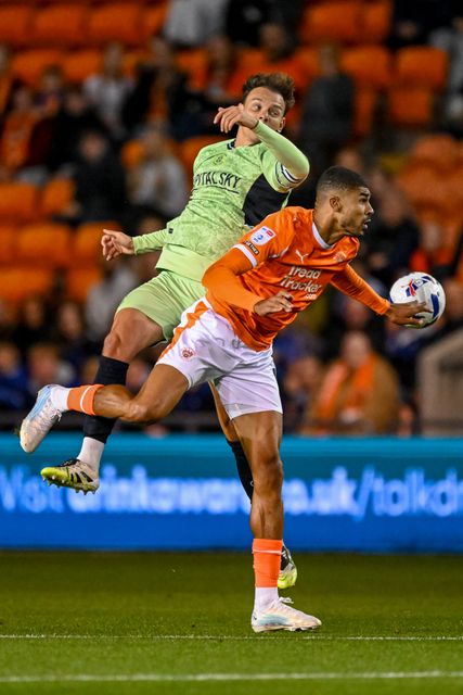 Ashley Fletcher of Blackpool  battles for the ball during the Sky Bet League 1 match Blackpool vs Luton Town at Bloomfield Road, Blackpool, United Kingdom, 30th September 2025

(Photo by Adam Gee/News Images)