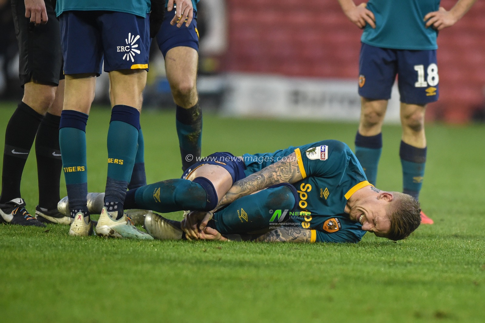 30th November 2019, Oakwell, Barnsley, England; Sky Bet Championship, Barnsley v Hull City :Jordy De Wijs (4) of Hull City injured on the floor.

Credit: Dean Williams/News Images