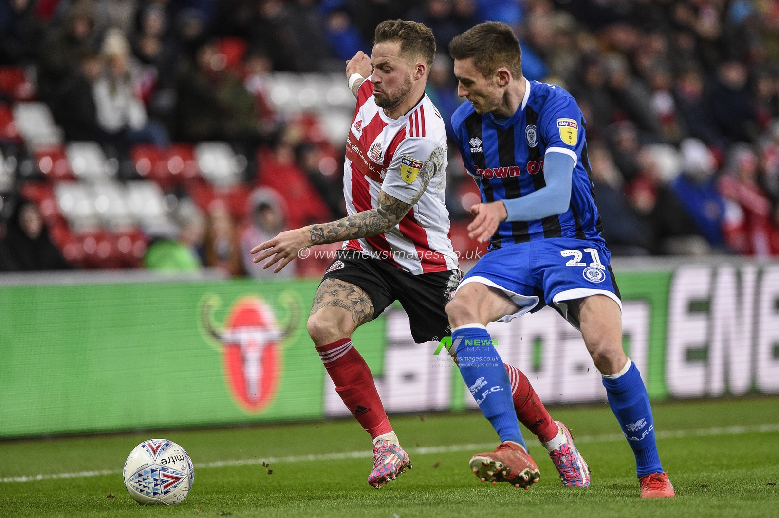 11th February 2020, Stadium Of Light, Sunderland, England; Sky Bet League 1, Sunderland v Rochdale : Chris Maguire (7) of Sunderland under pressure from Matthew Lund (21) of Rochdale