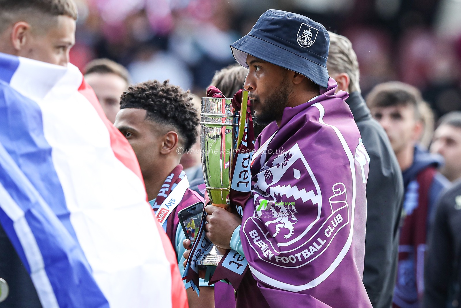 Nathan Redmond of Burnley kissing the runners up trophy after the Sky Bet Championship match Burnley vs Millwall at Turf Moor, Burnley, United Kingdom, 3rd May 2025

(Photo by Jorge Horsted/News Images)