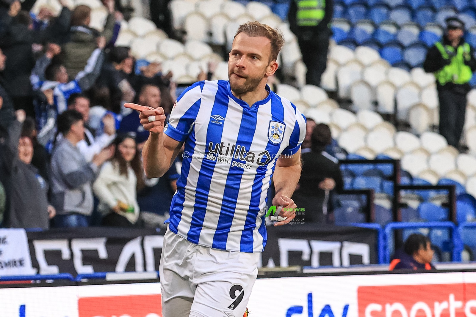 Jordan Rhodes #9 of Huddersfield Town celebrates his goal to make it 1-0