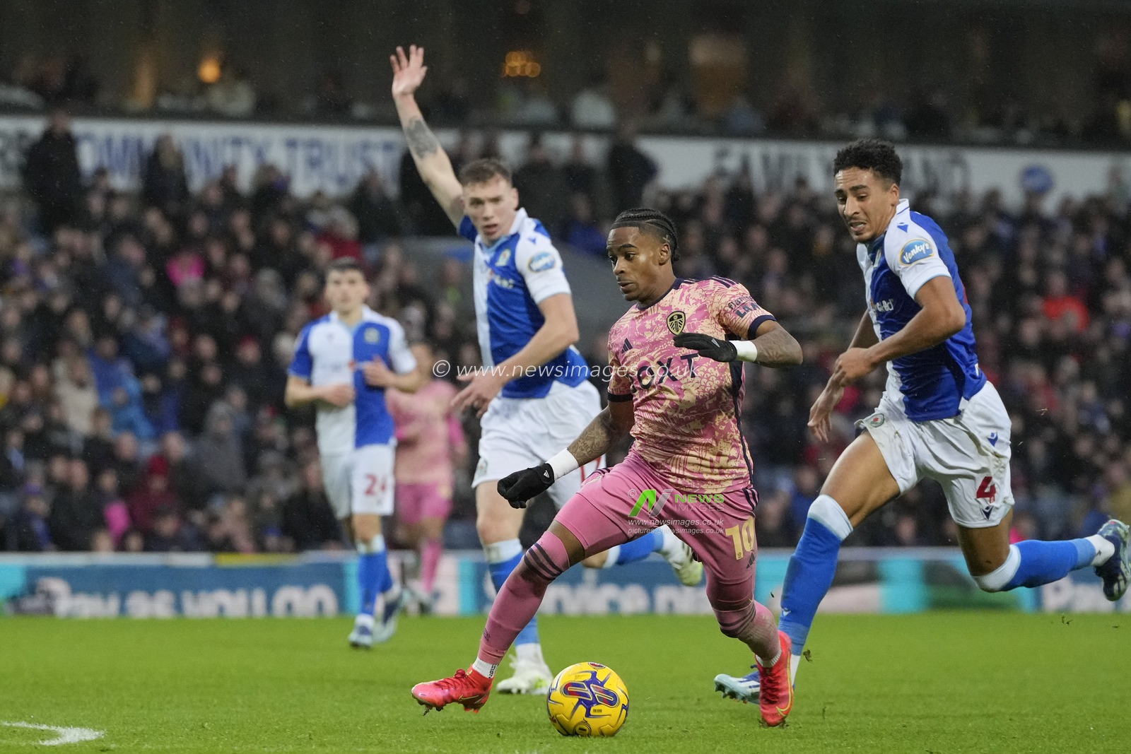 Crysencio Summerville #10 of Leeds United breaks past James Hill #4 of Blackburn Rovers on the way to scoring to make it 0-2 during the Sky Bet Championship match Blackburn Rovers vs Leeds United at Ewood Park, Blackburn, United Kingdom, 9th December 2023

(Photo by Steve Flynn/News Images)