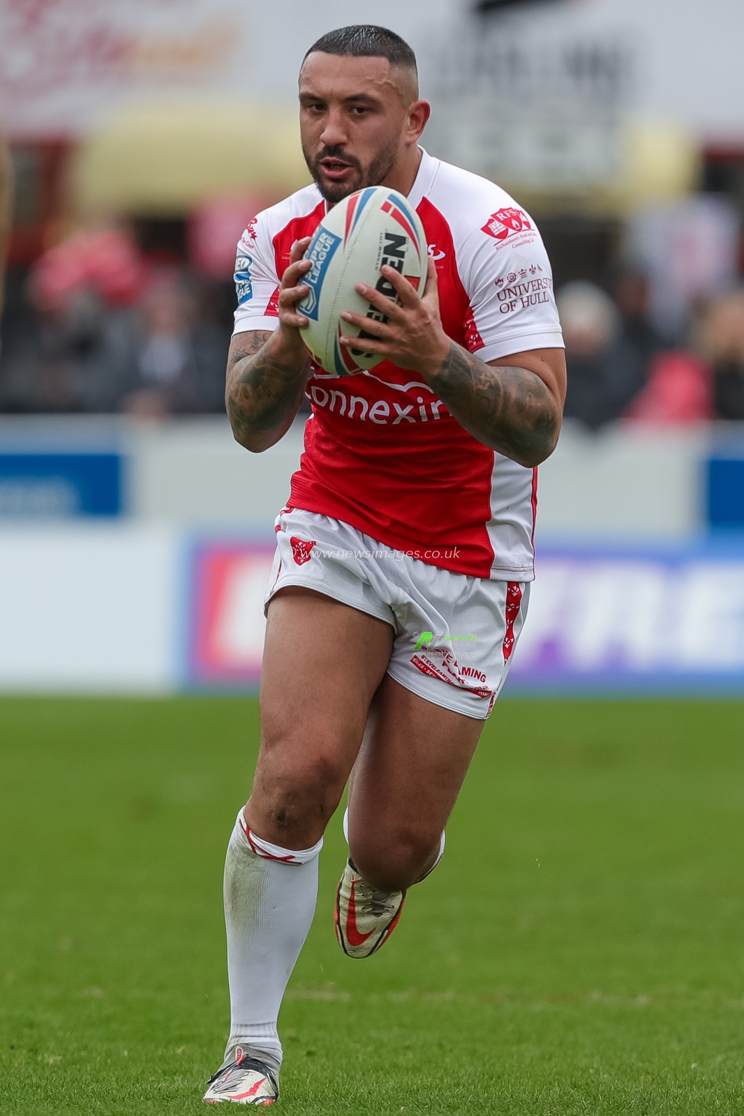 Elliot Minchella #13 of Hull KR runs with the ball during the Betfred Super League Round 1 match Hull KR vs Wigan Warriors at Sewell Group Craven Park, Kingston upon Hull, United Kingdom, 18th February 2023

(Photo by James Heaton/News Images)