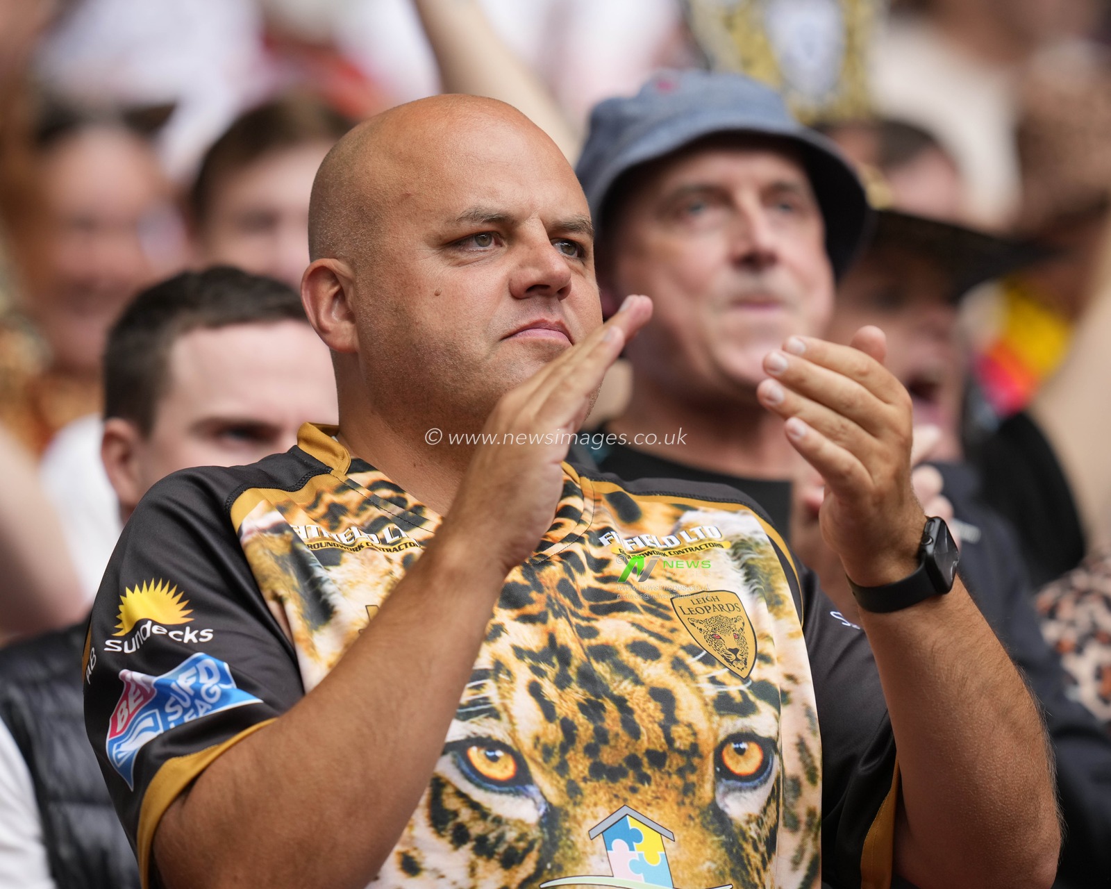 A Leigh Leopards fan applauds his team during the Betfred Challenge Cup match Hull KR vs Leigh Leopards at Wembley Stadium, London, United Kingdom, 12th August 2023

(Photo by Steve Flynn/News Images)