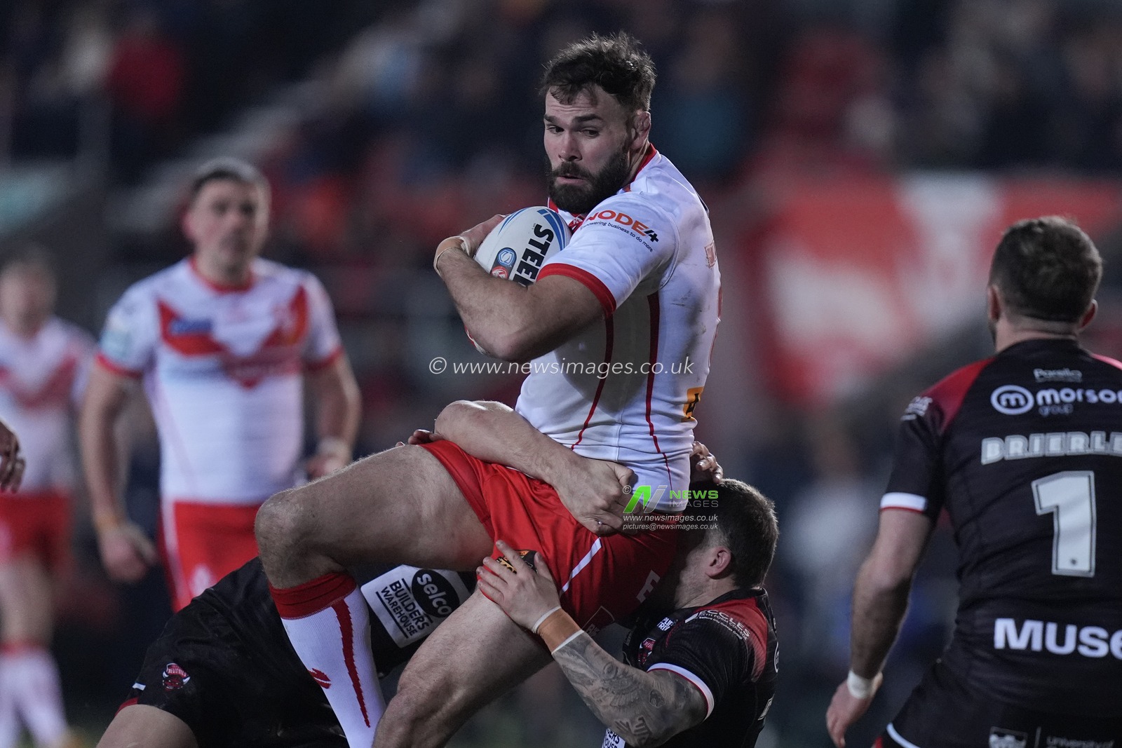 Alex Walmsley of St. Helens runs at the Salford Red Devils defence during the Betfred Super League Round 4 match St Helens vs Salford Red Devils at Totally Wicked Stadium, St Helens, United Kingdom, 8th March 2024

(Photo by Steve Flynn/News Images)
