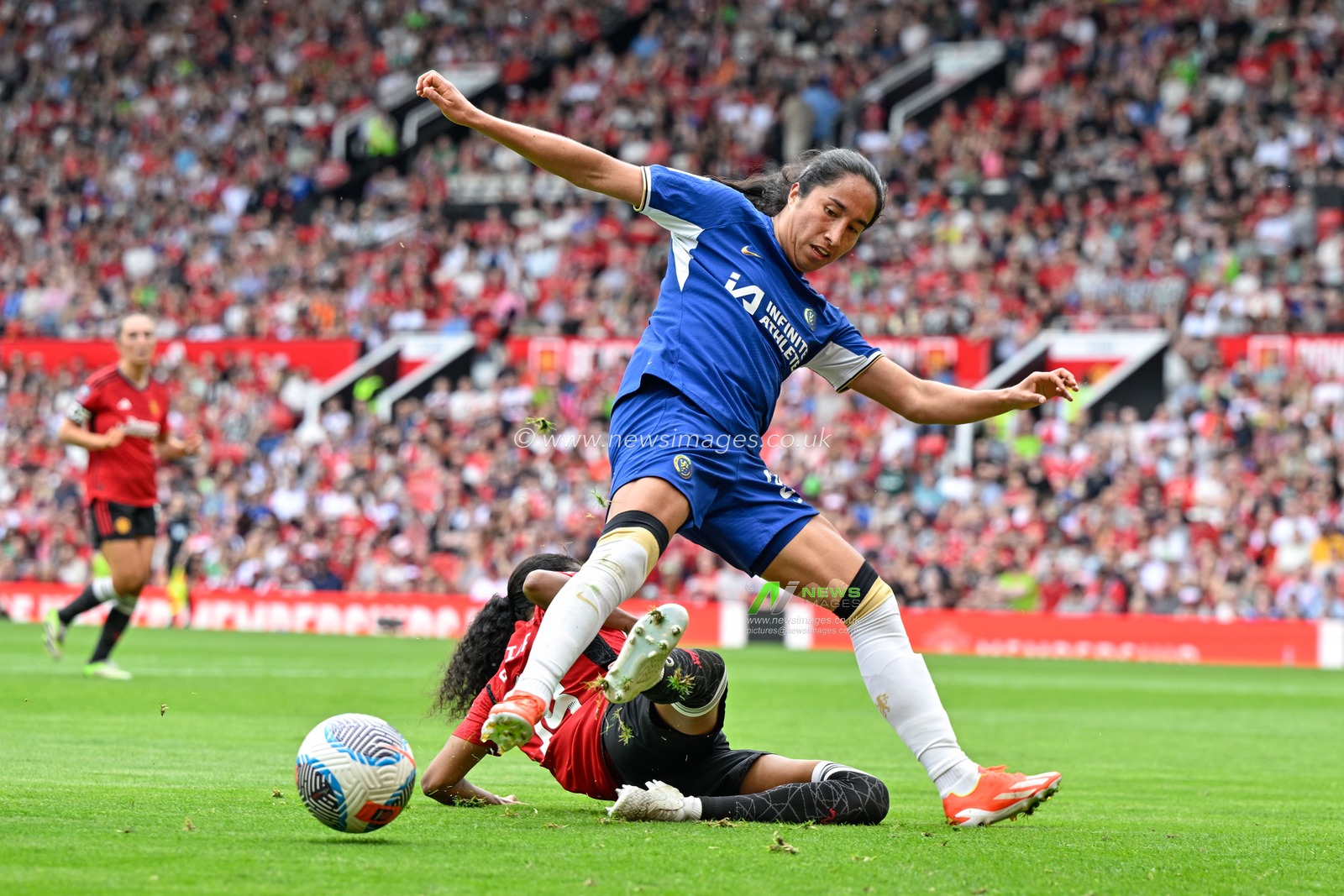 Jayde Riviere of Manchester United Women tackles Mayra RamÃ­rez of Chelsea Women, during the The FA Women's Super League match Manchester United Women vs Chelsea FC Women at Old Trafford, Manchester, United Kingdom, 18th May 2024

(Photo by Cody Froggatt/News Images)