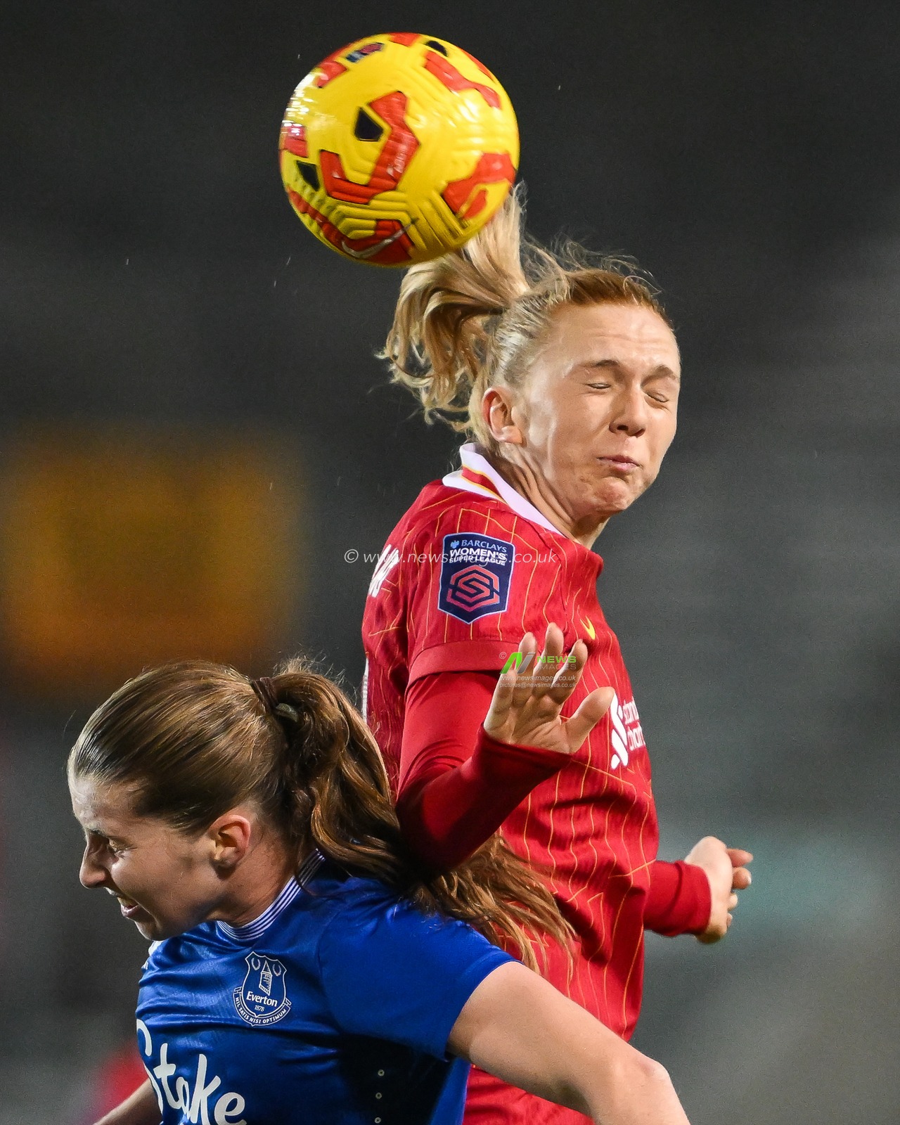 Ceri Holland of Liverpool jumps up to win the high ball during the Women's League Cup - Group Stage - Group A Liverpool Women v Everton Women at St Helens Stadium, St Helens, United Kingdom, 11th December 2024

(Photo by Craig Thomas/News Images)