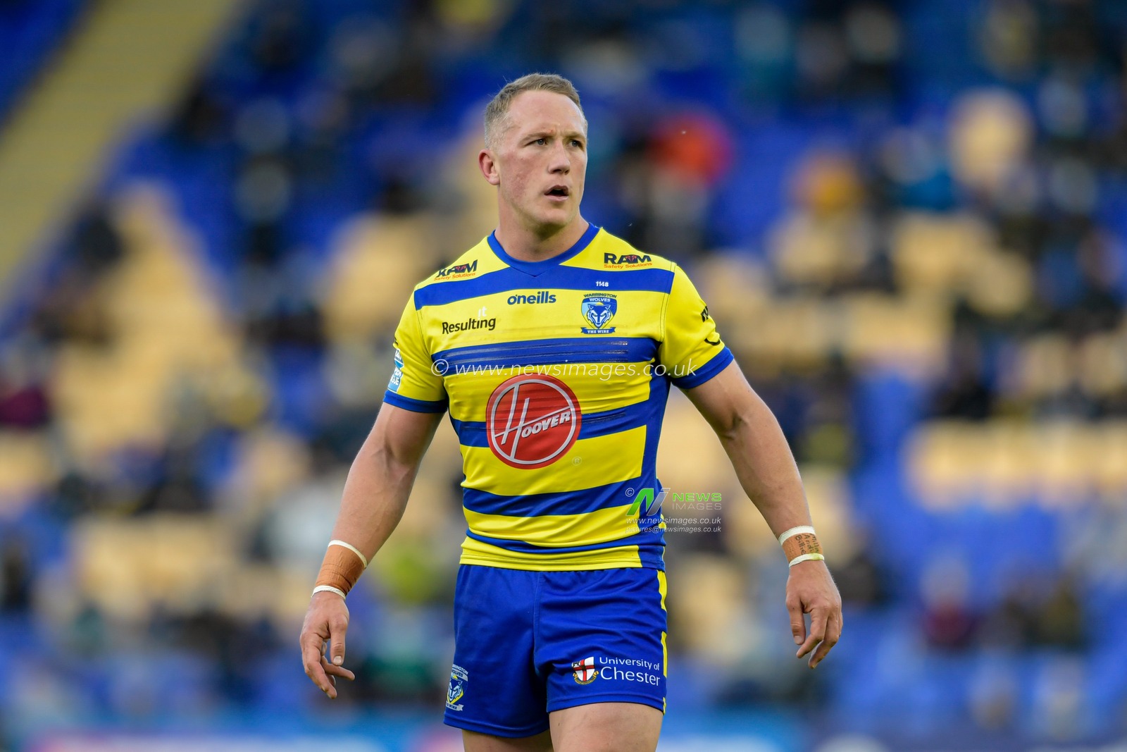 Jason Clark (14) of Warrington Wolves in action during the game