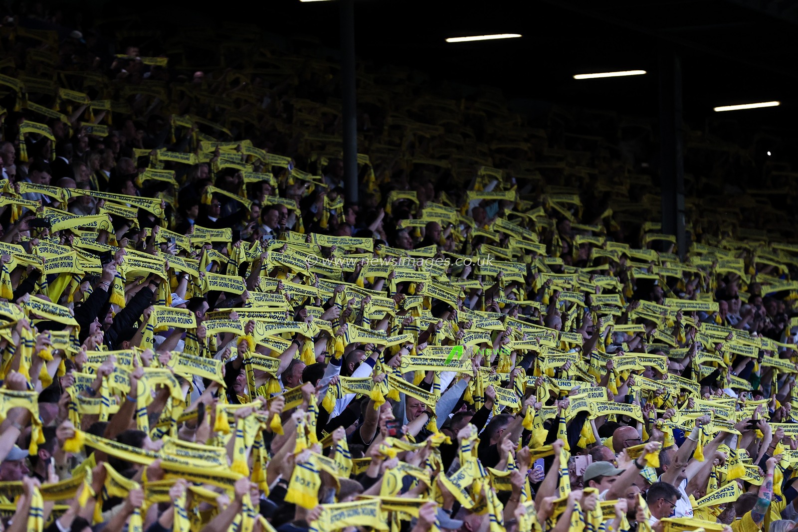 Leeds United fans hold up scarves ahead of the Sky Bet Championship match Leeds United vs Bristol City at Elland Road, Leeds, United Kingdom, 28th April 2025

(Photo by Alfie Cosgrove/News Images)