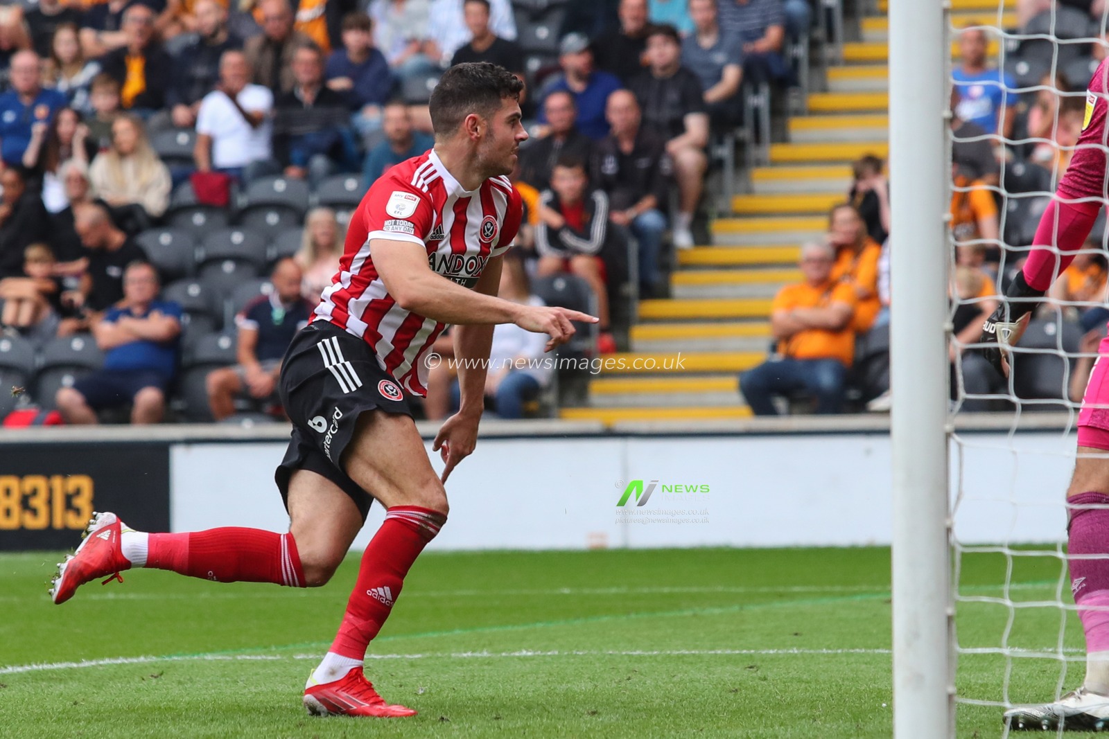 John Egan #12 of Sheffield United celebrates his goal to make it 0-2
