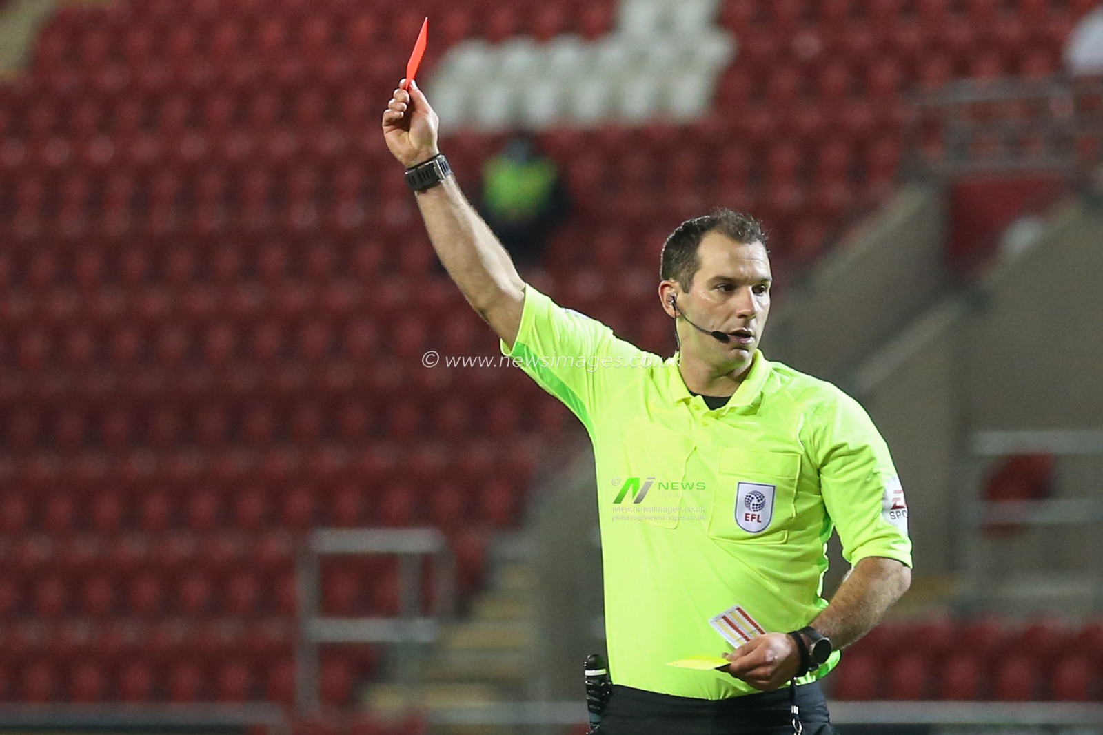 Mickel Miller #14 of Rotherham United is sent off