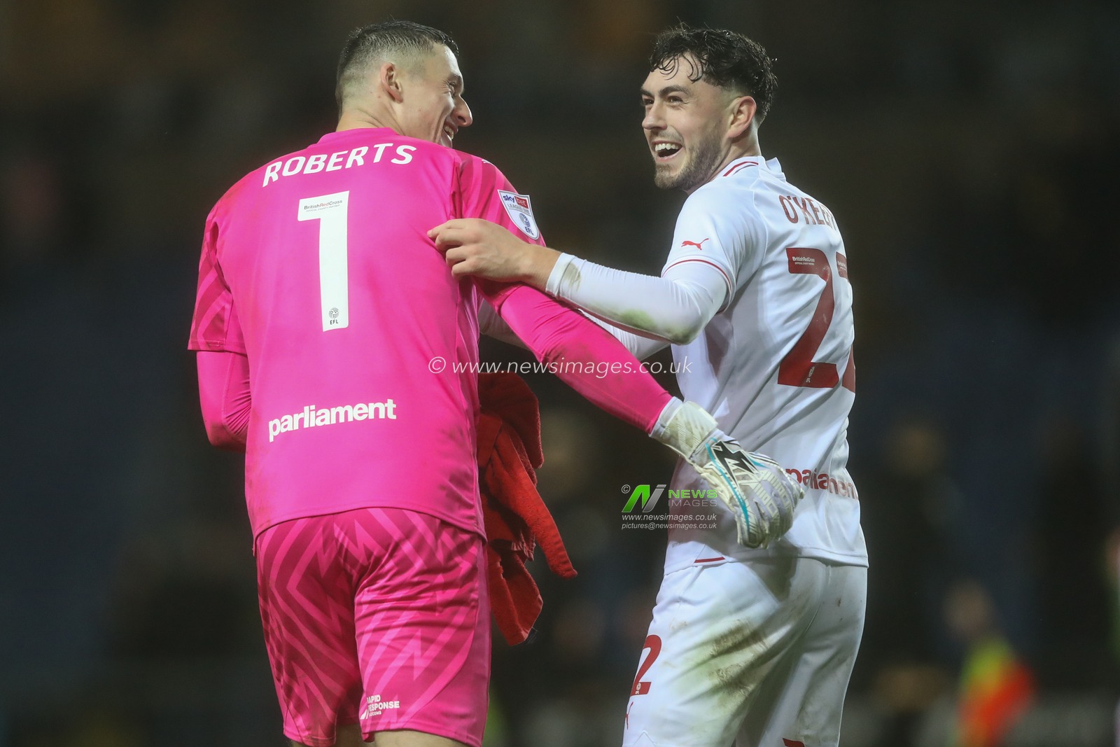 Liam Roberts of Barnsley embraces Corey O'Keeffe of Barnsley after a 0-1 win during the Sky Bet League 1 match Oxford United vs Barnsley at Kassam Stadium, Oxford, United Kingdom, 23rd January 2024

(Photo by Alfie Cosgrove/News Images)