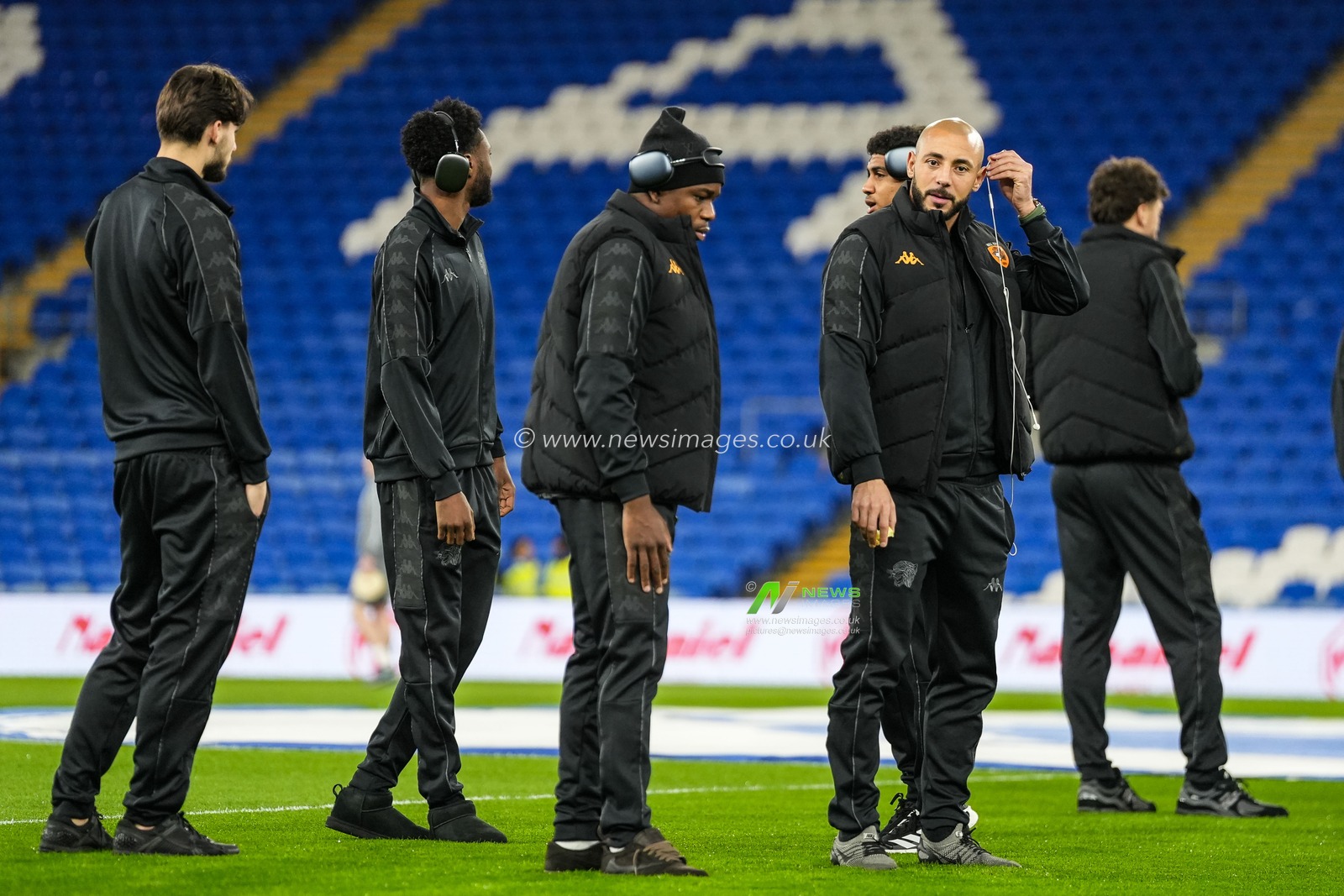 Hull City players inspect the pitch ahead of the Sky Bet Championship match Cardiff City vs Hull City at Cardiff City Stadium, Cardiff, United Kingdom, 25th February 2025

(Photo by Andrew Lewis/News Images)
