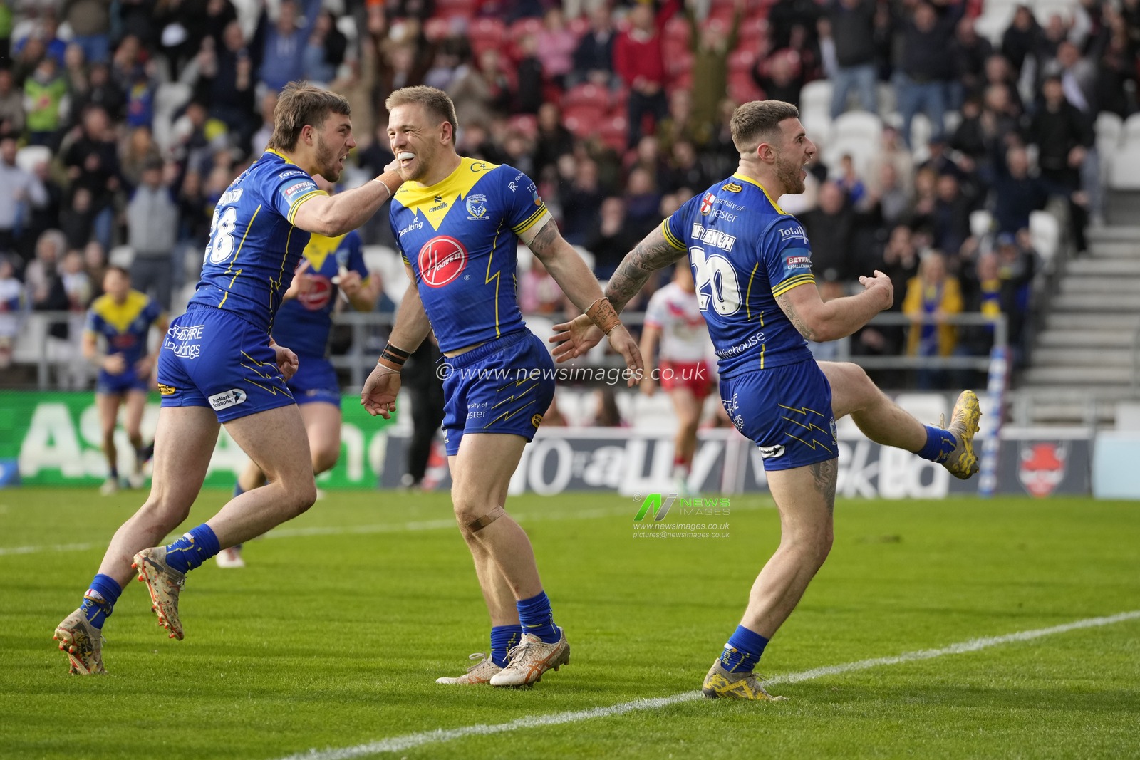 Connor Wrench of Warrington Wolves celebrates scoring a try during the Betfred Challenge Cup Quarter Final match St Helens vs Warrington Wolves at Totally Wicked Stadium, St Helens, United Kingdom, 14th April 2024

(Photo by Steve Flynn/News Images)
