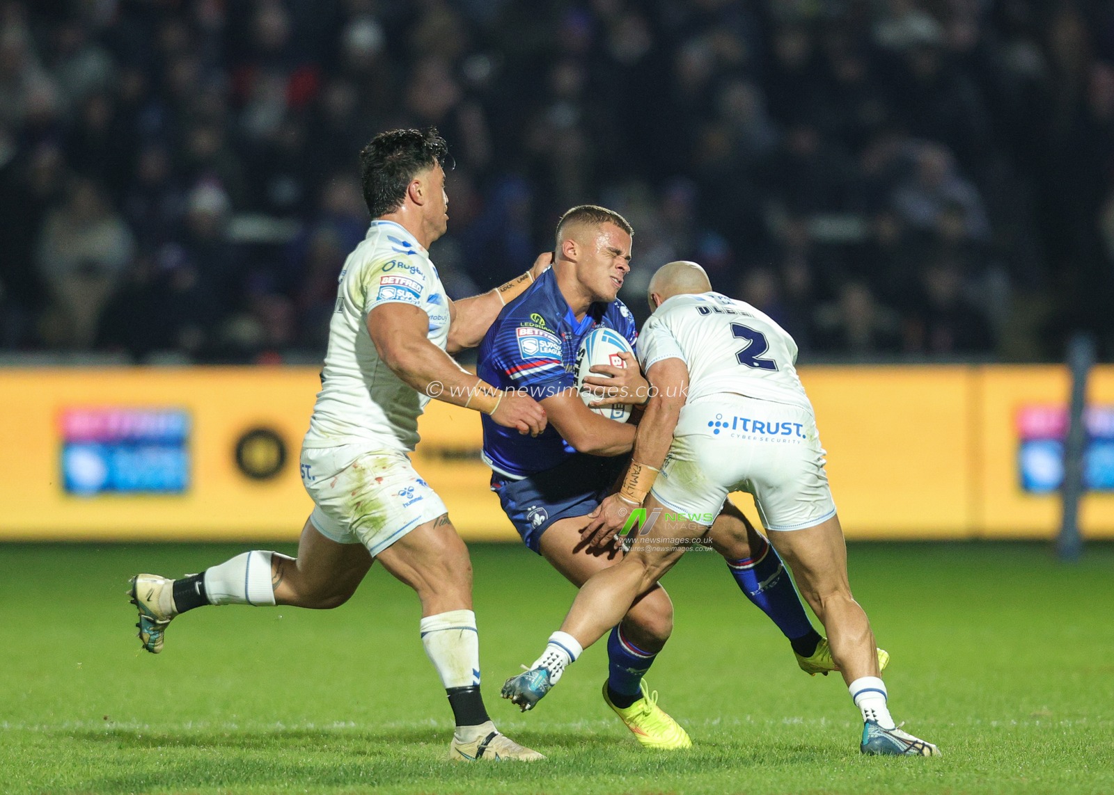 Corey Hall of Wakefield Trinity is tackled by Paul Ulberg of Toulouse Olympique  during the Betfred Super League Round 1 match Wakefield Trinity vs Toulouse Olympique at DIY Kitchens Stadium, Wakefield, United Kingdom on 14 February 2026

(Photo by Richard Bierton/News Images)