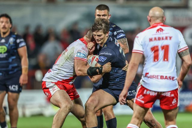 Harvey Makin of Wigan Warriors is tackled by Jared Waerea-Hargreaves of Hull KR during the Betfred Super League Round 7 match Hull KR vs Wigan Warriors at Sewell Group Craven Park, Kingston upon Hull, United Kingdom, 11th April 2025

(Photo by Alfie Cosgrove/News Images)