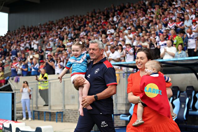 Daryl Powell, Head Coach of Wakefield Trinity walks out with his grandson before the Betfred Super League Round 14 match Wakefield Trinity vs Leigh Leopards at DIY Kitchens Stadium, Wakefield, United Kingdom, 15th June 2025

(Photo by Sam Eaden/News Images)